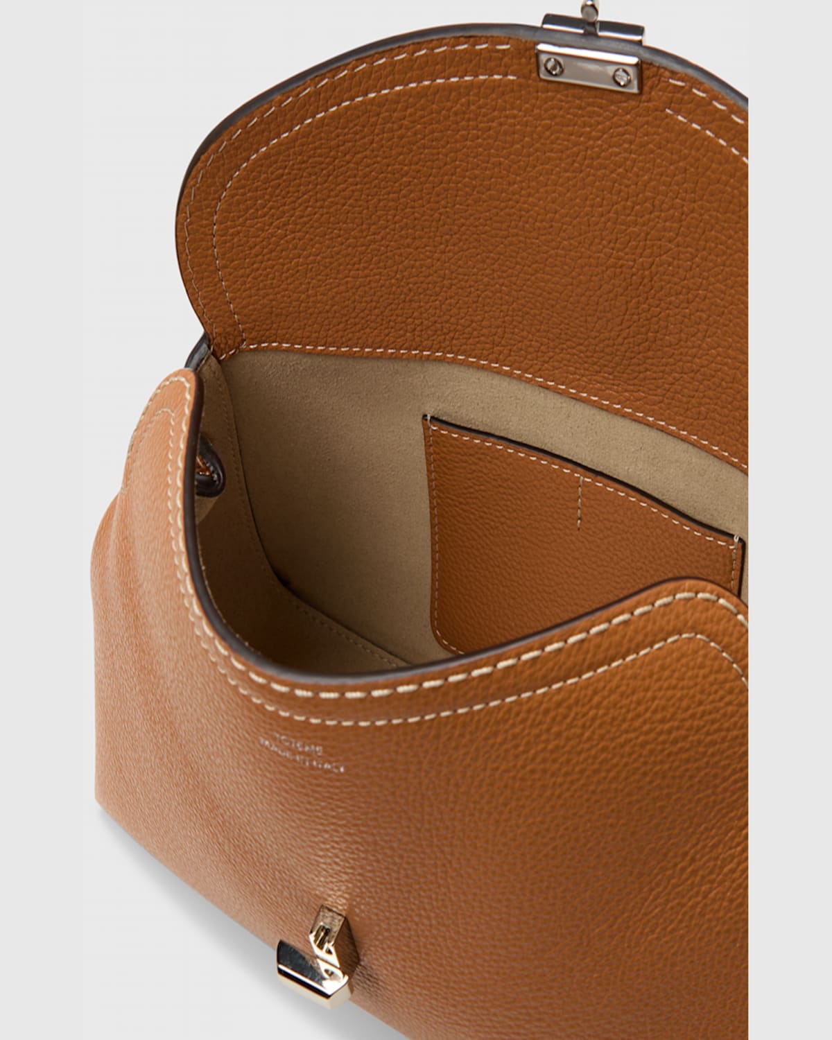 Totême T-lock Top Handle Bag In Pebble Grain Leather In Tan