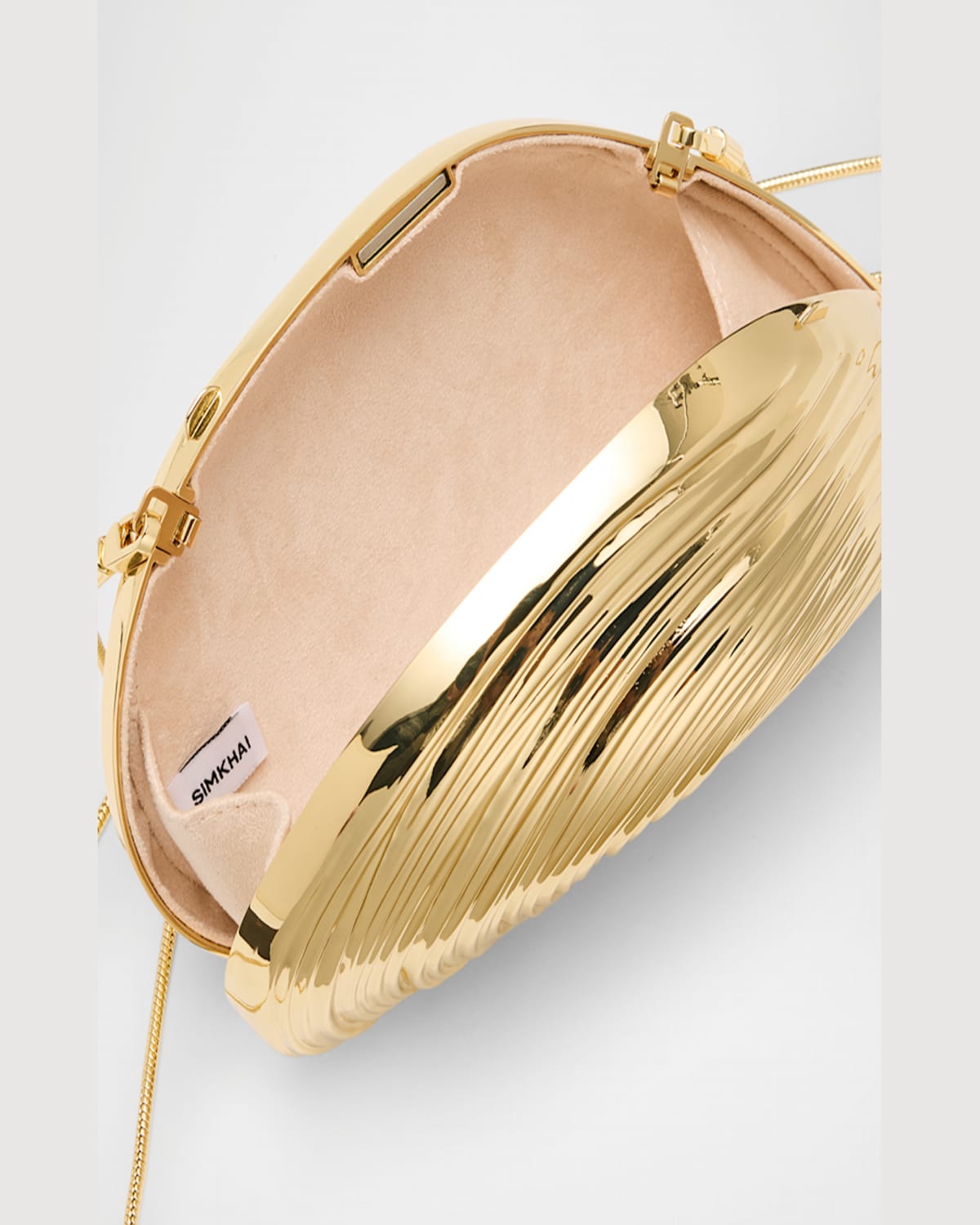 Simkhai Bridget Metal Oyster Shell Clutch In Gold