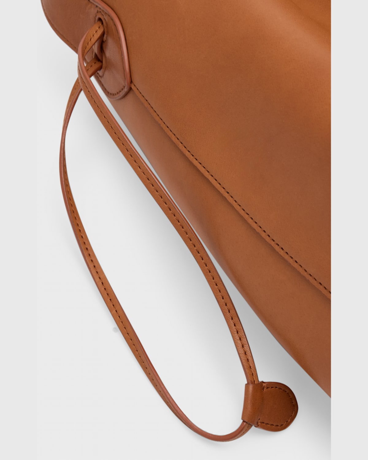 Shop The Row Belvedere Bucket Bag In Saddle Leather In Brandy