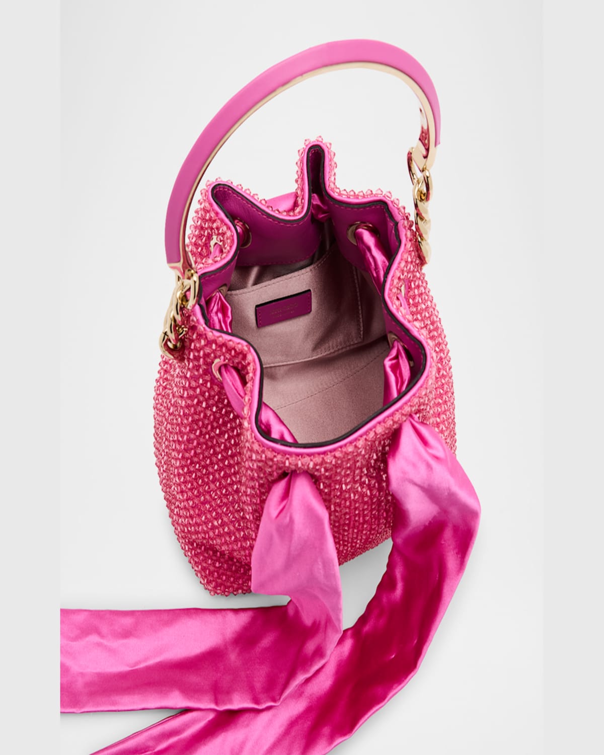 Jimmy Choo Bon Bon Bow Metallic Raffia Bucket Bag In Lmagltgld
