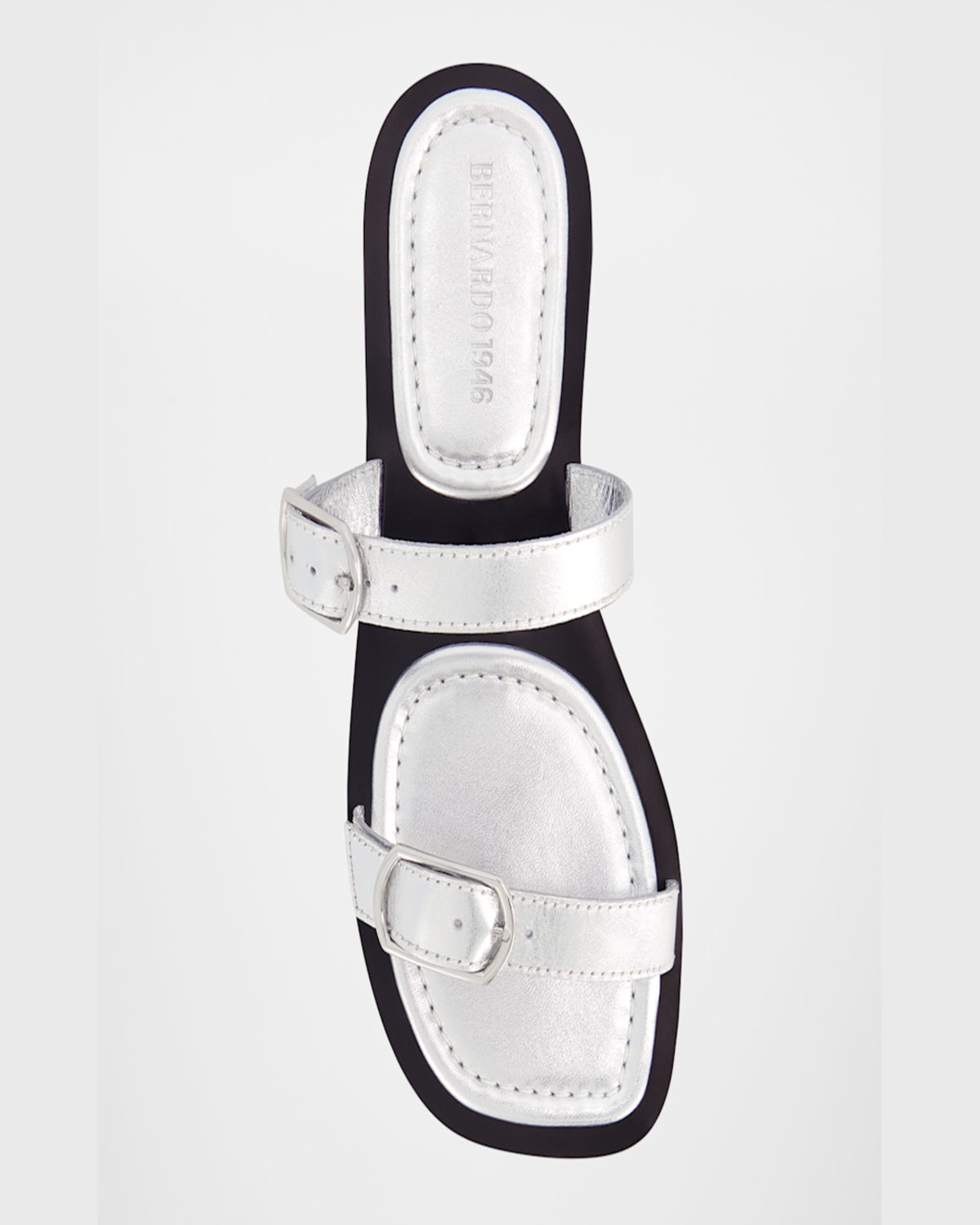 Bernardo 1946 Arta Buckle Metallic Leather Flat Sandals In Light Silver Metallic Glove Leather