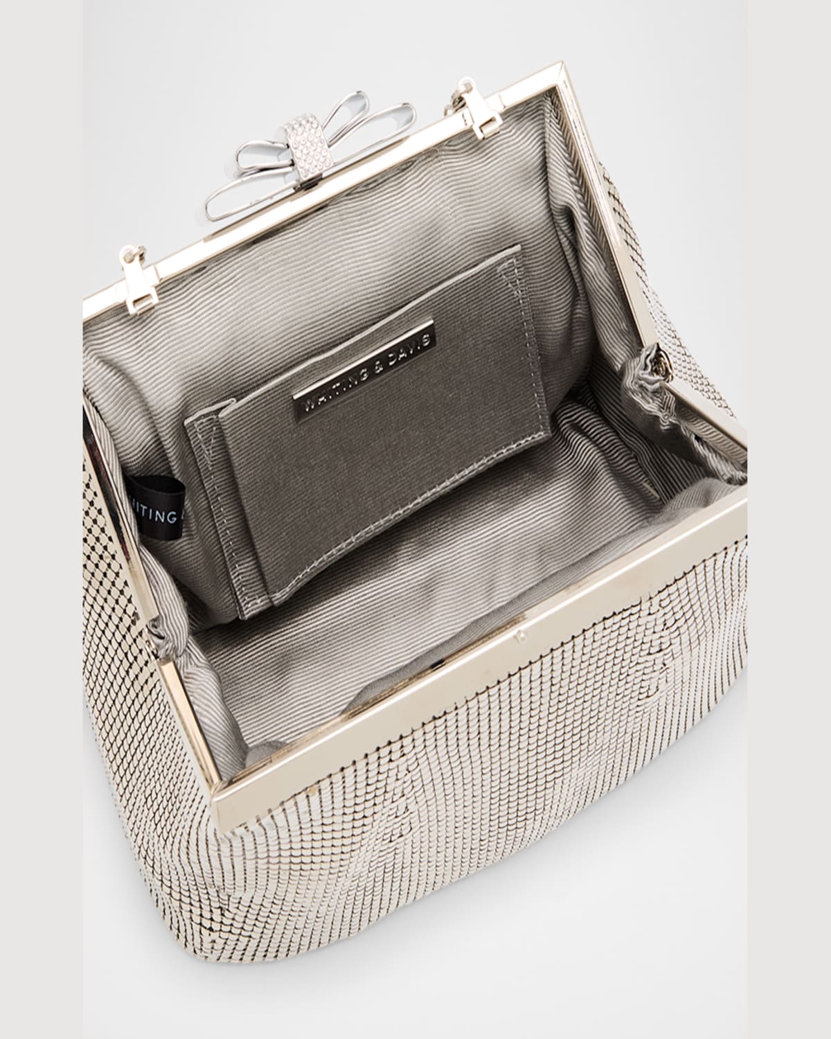 Whiting & Davis Blake Bow Mesh Brass Clutch Bag In Pewter