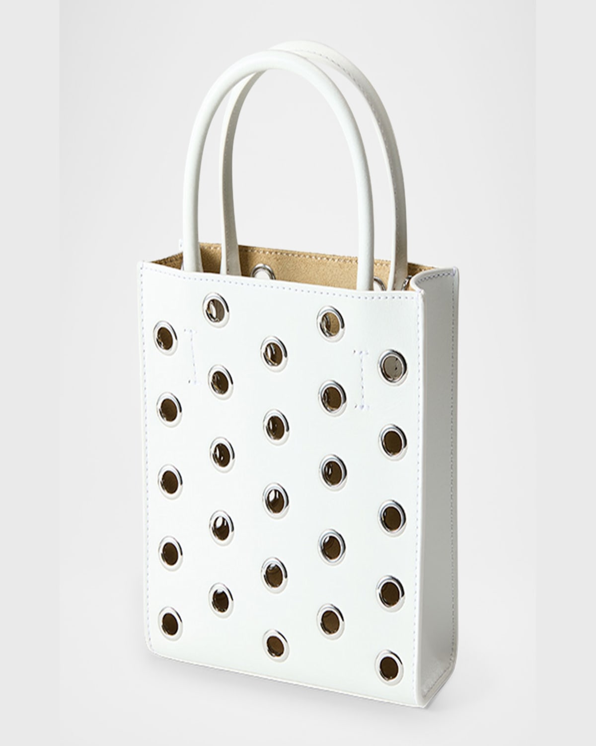 Shop Veronica Beard Small Grommet Leather Shopper Crossbody Bag In Off Whitesilver