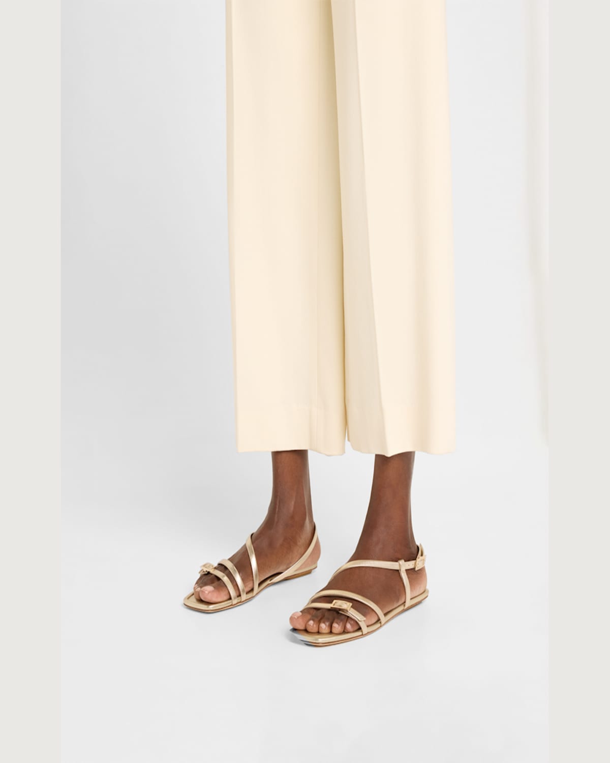 Stuart Weitzman Georgie Metallic Strappy Flat Sandals In Light Gold