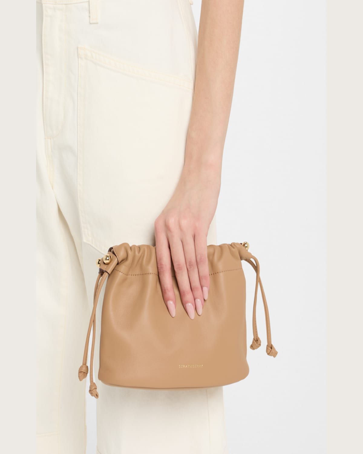 Strathberry Charlotte Drawstring Leather Clutch Bag In Caramel