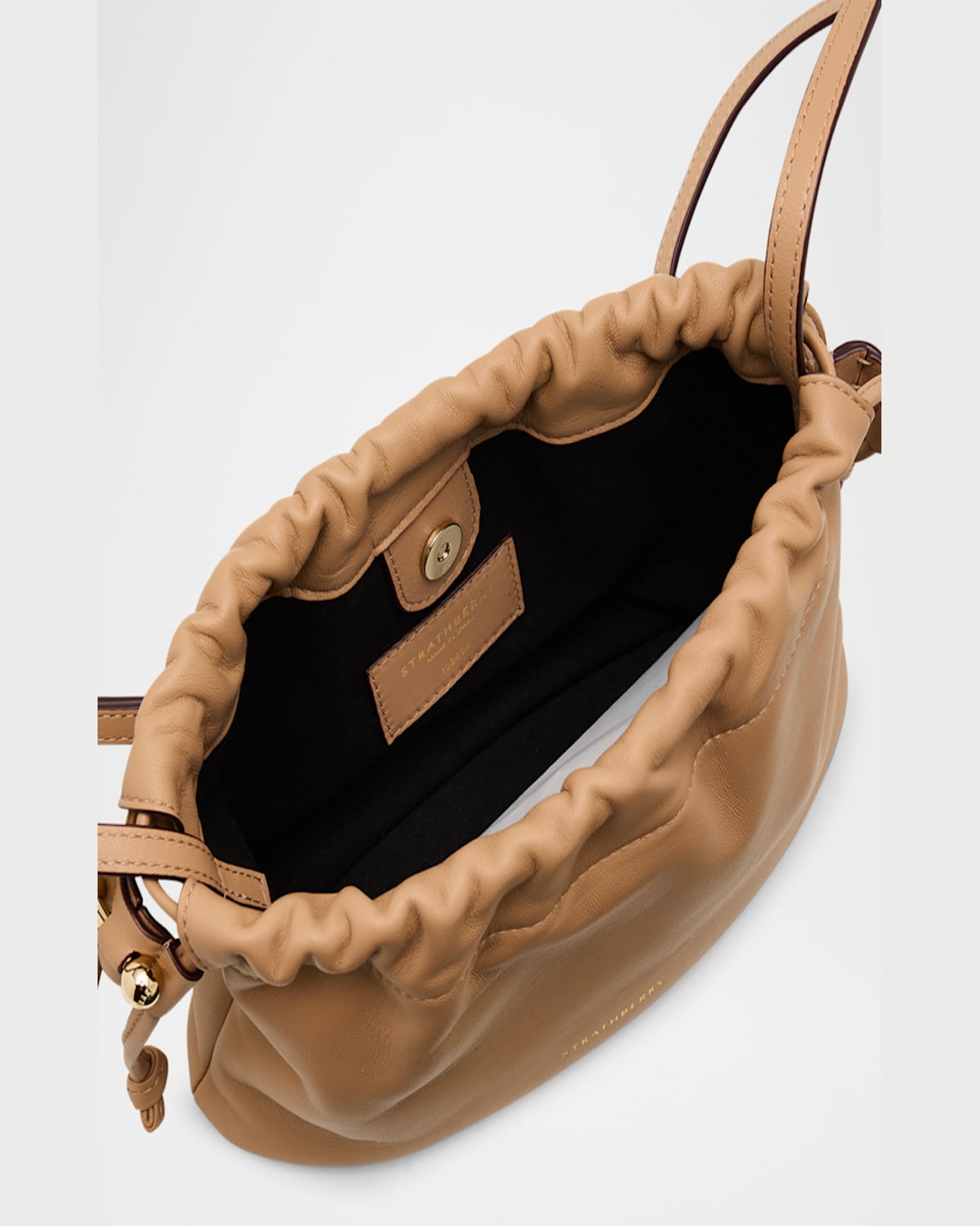 Strathberry Charlotte Drawstring Leather Clutch Bag In Caramel