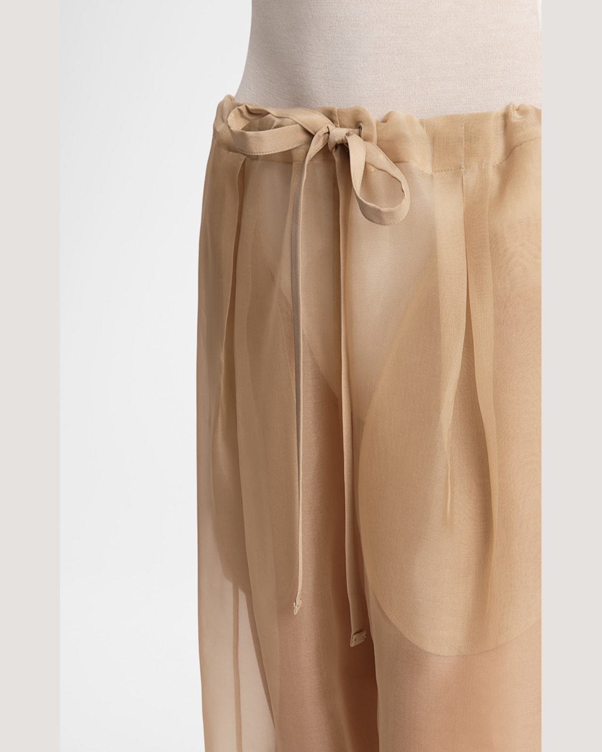 Khaite Trenton Pleated Silk-organza Tapered Pants In Beige