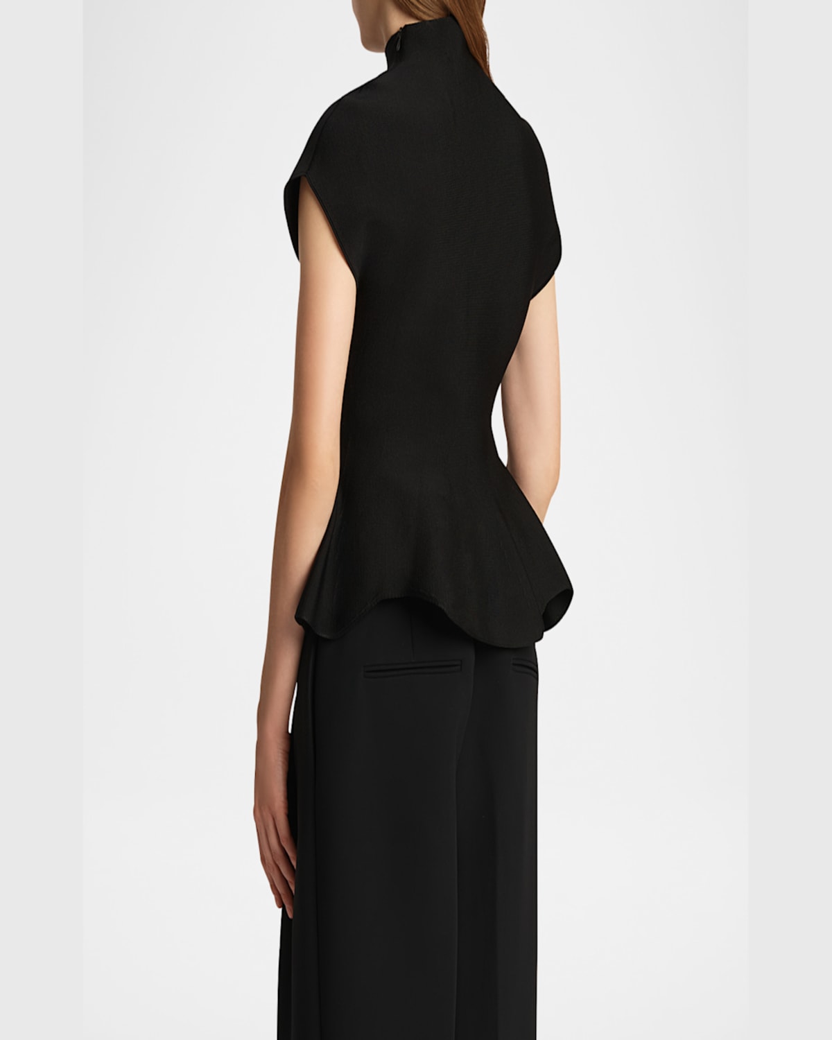 Khaite Andra Knit Peplum Top In Black