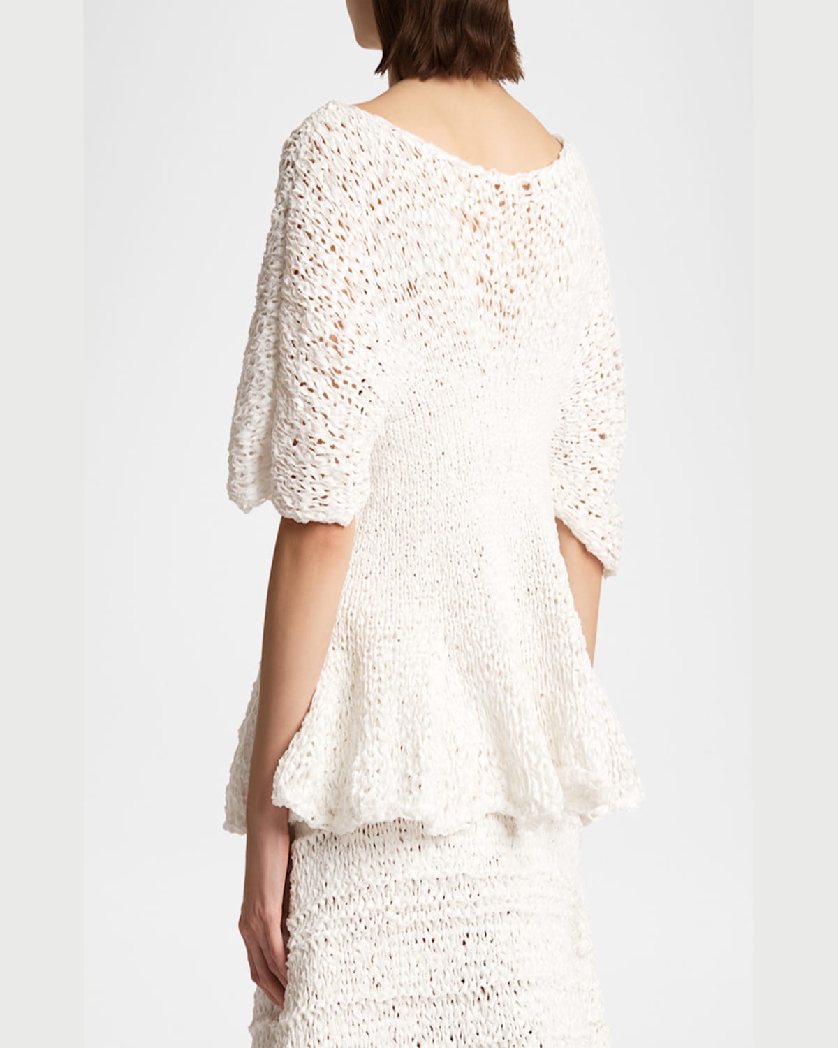 Shop Khaite Mathilde Peplum Batwing Cotton Top In Glaze