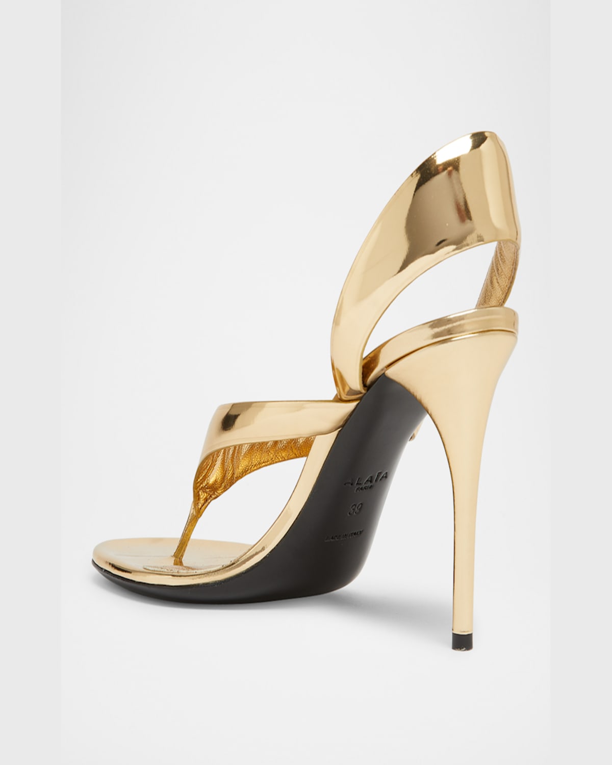Shop Alaïa Tong Metallic Leather Sandals In Platine