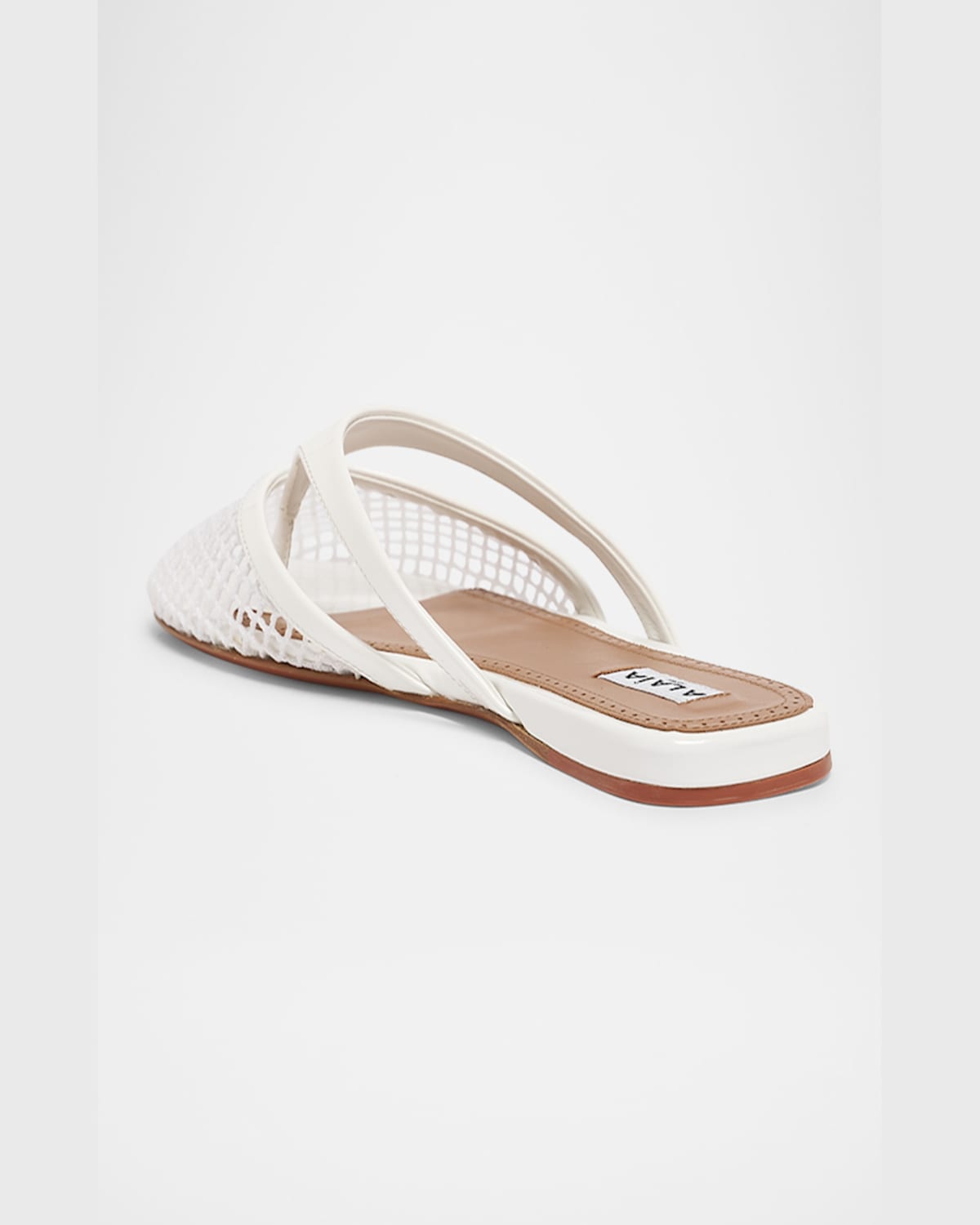 Shop Alaïa Net Leather Thong Mules In Blanc Optique