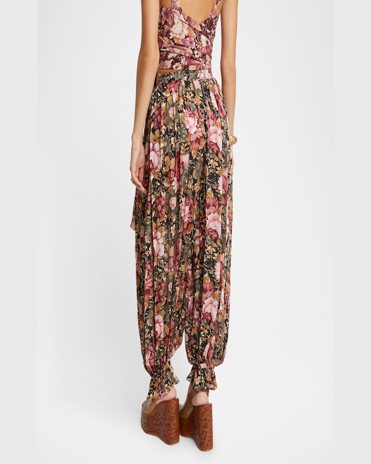 Shop Chloé Floral Pleated Silk Pants In Black