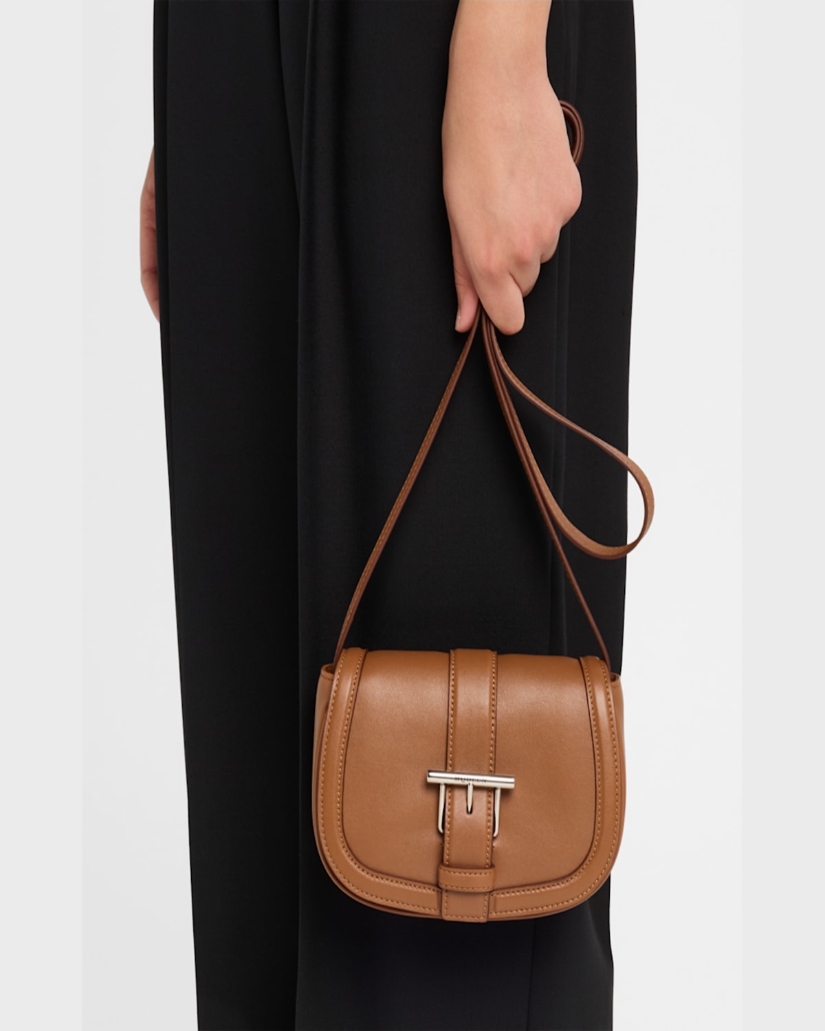 Alexander Mcqueen Mini T Bar Leather Saddle Crossbody Bag In Tan Silver