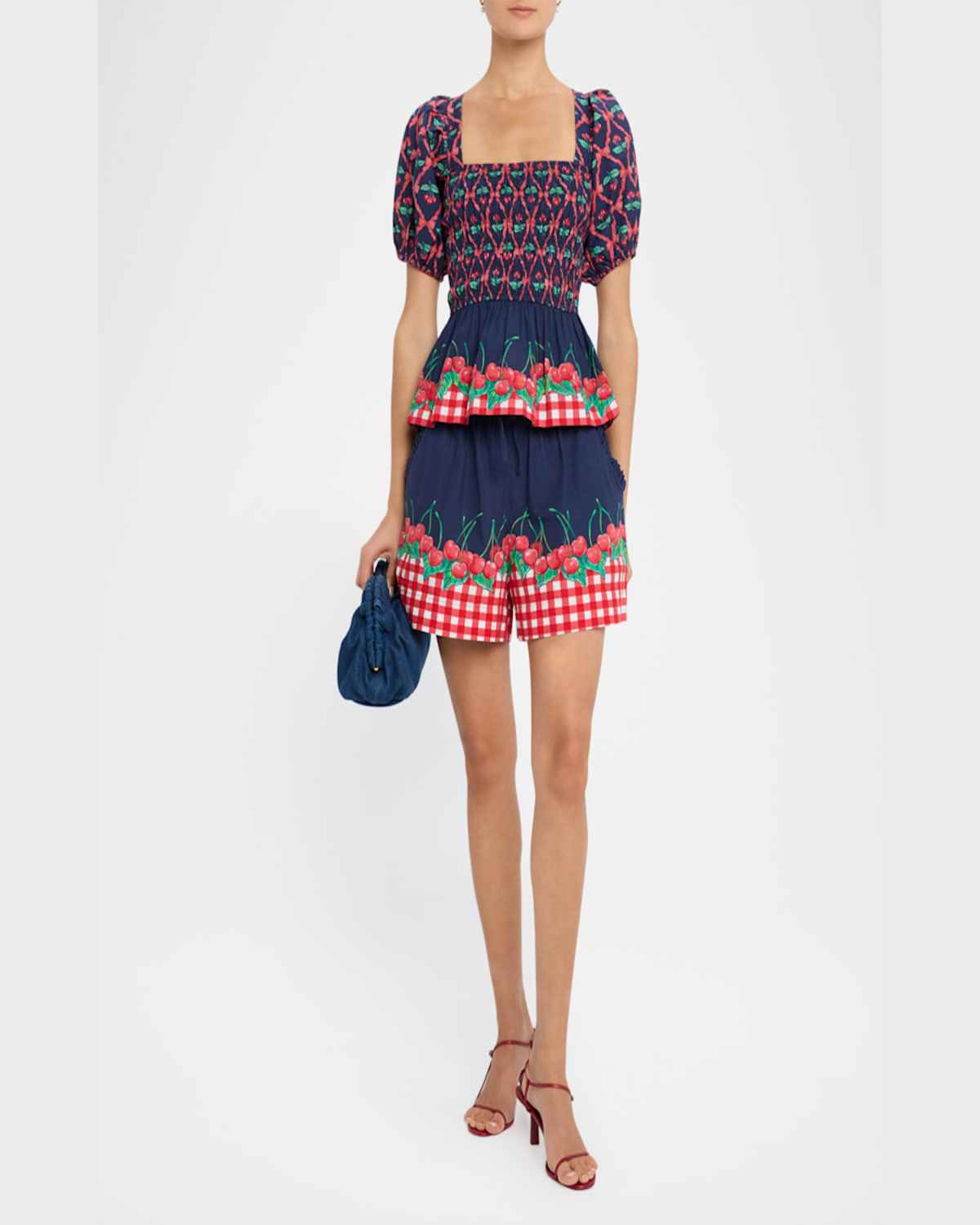 Damson Madder Allegra Cherry Pie Smocked Organic Cotton Peplum Top In Navyred