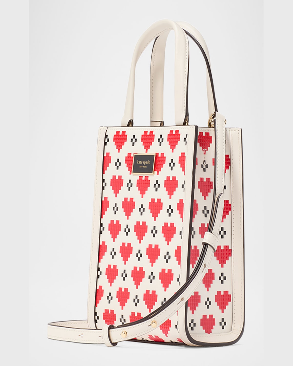 Shop Kate Spade Manhattan Mini Pixel Heart Leather Tote Crossbody Bag In Cream.