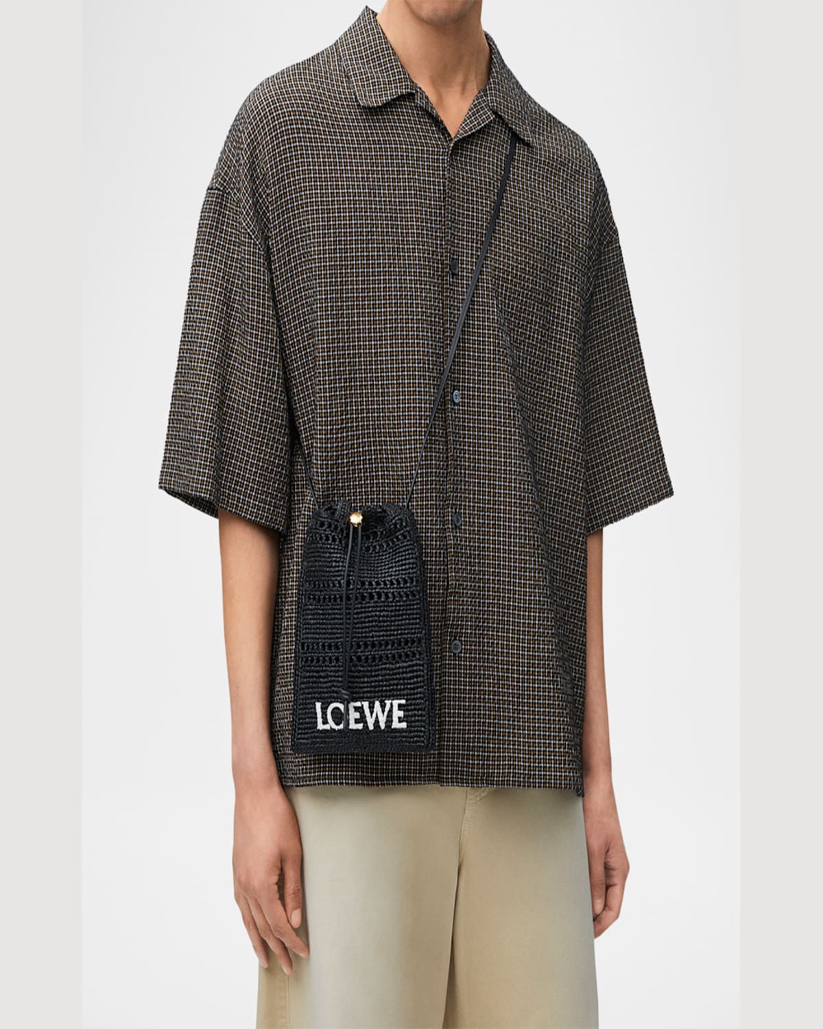 Loewe Drawstring Pocket Crossbody Bag In Raffia In Black