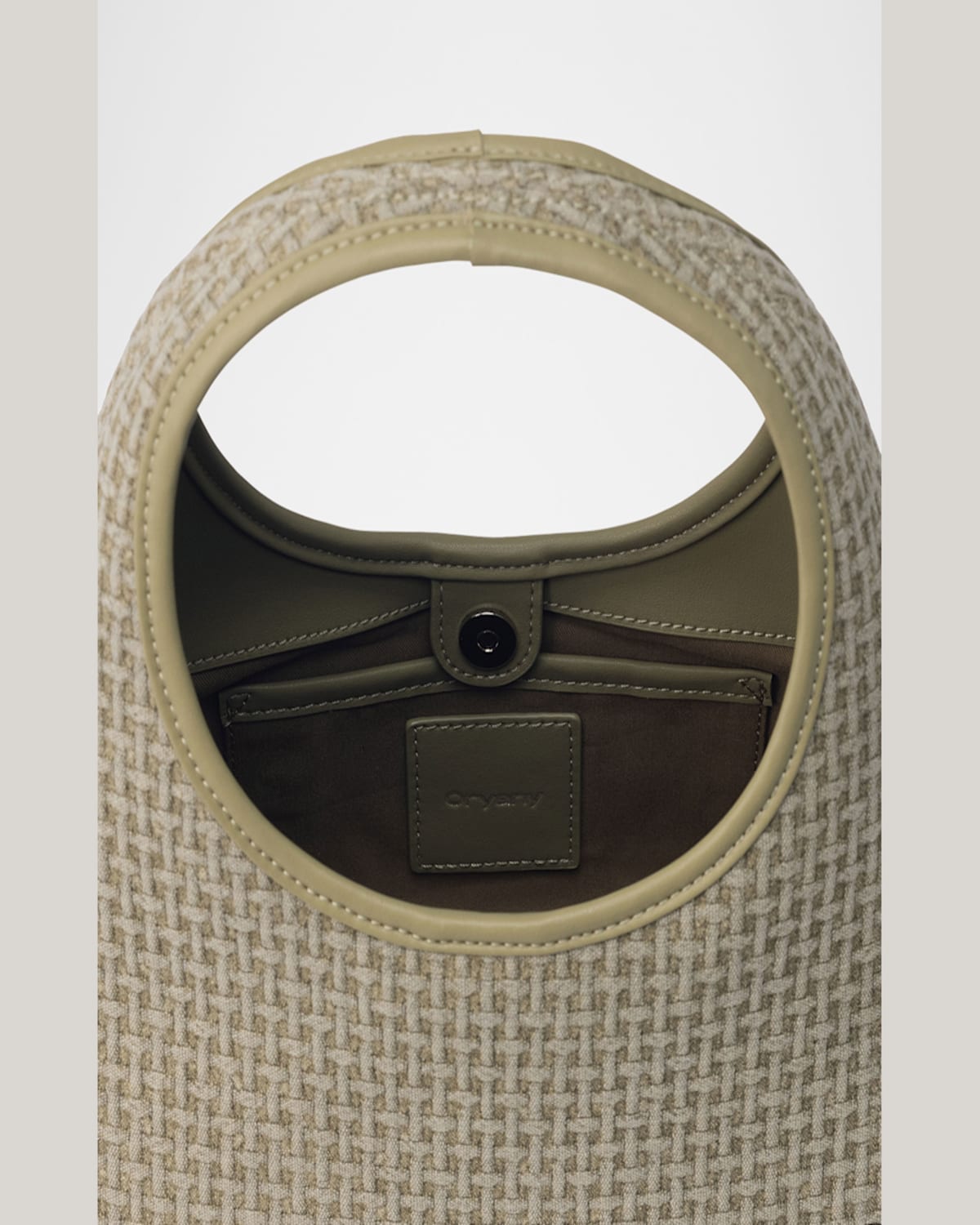 ORYANY WAFFLE CANVAS TOP-HANDLE BAG 