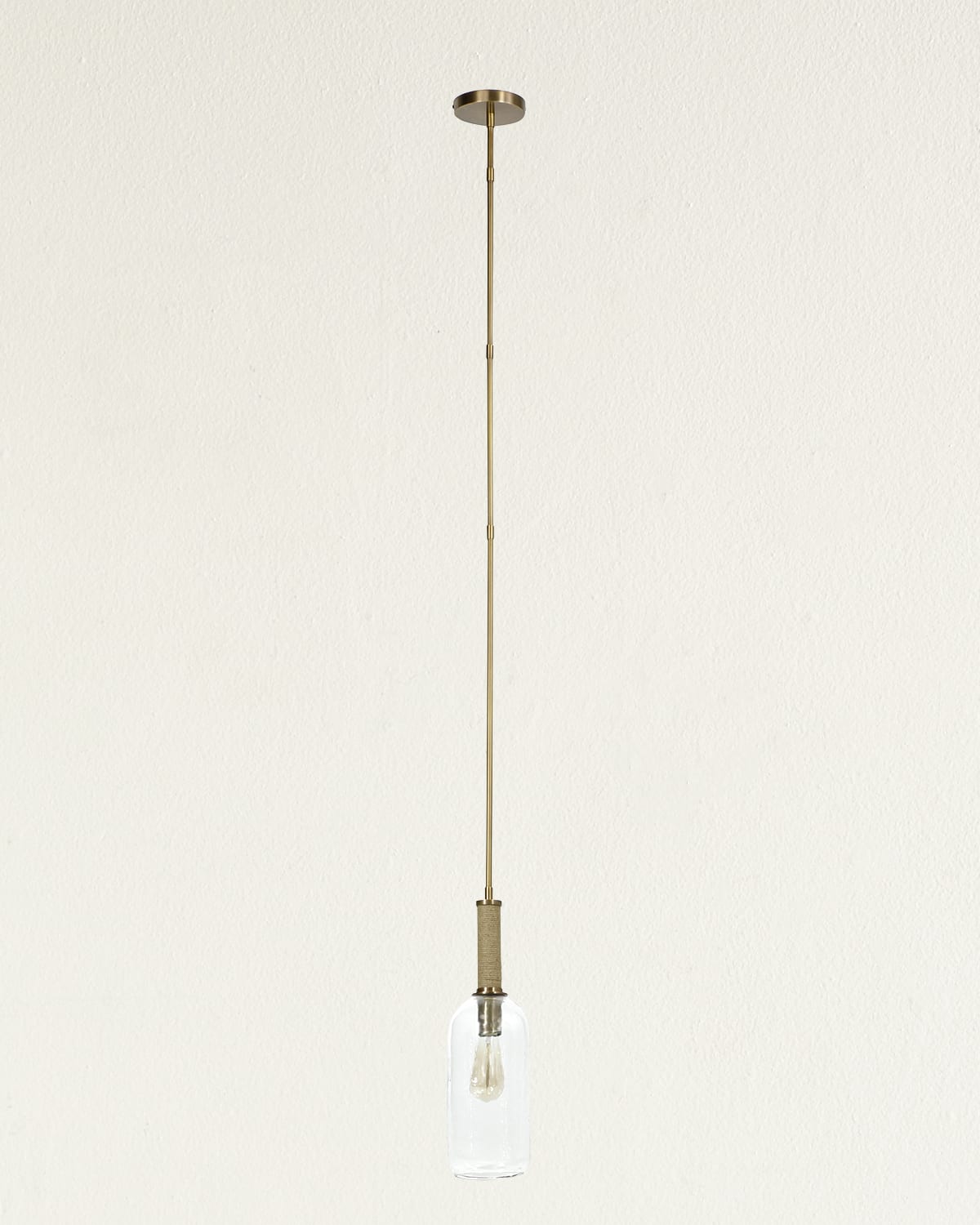 Shop Palecek Bronson Glass Long Pendant Light In Antique Brass