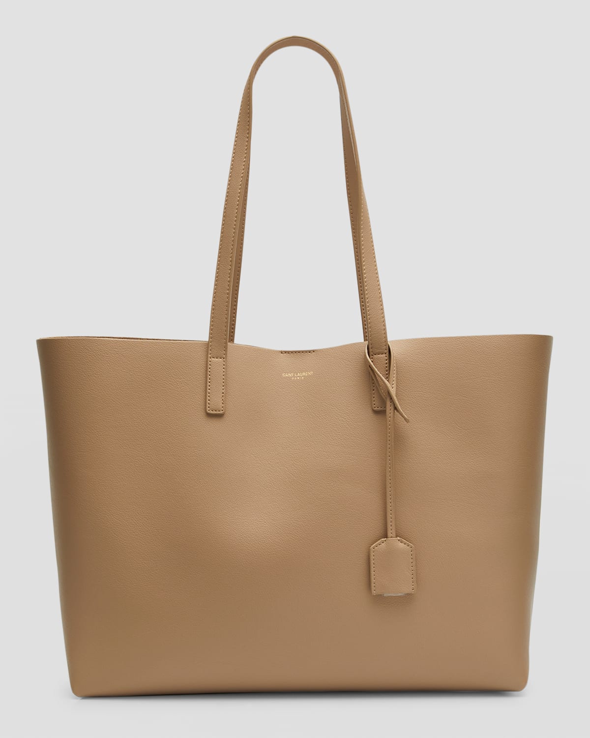 Saint Laurent East West Calfskin Shopping Tote Bag In Dark Beige