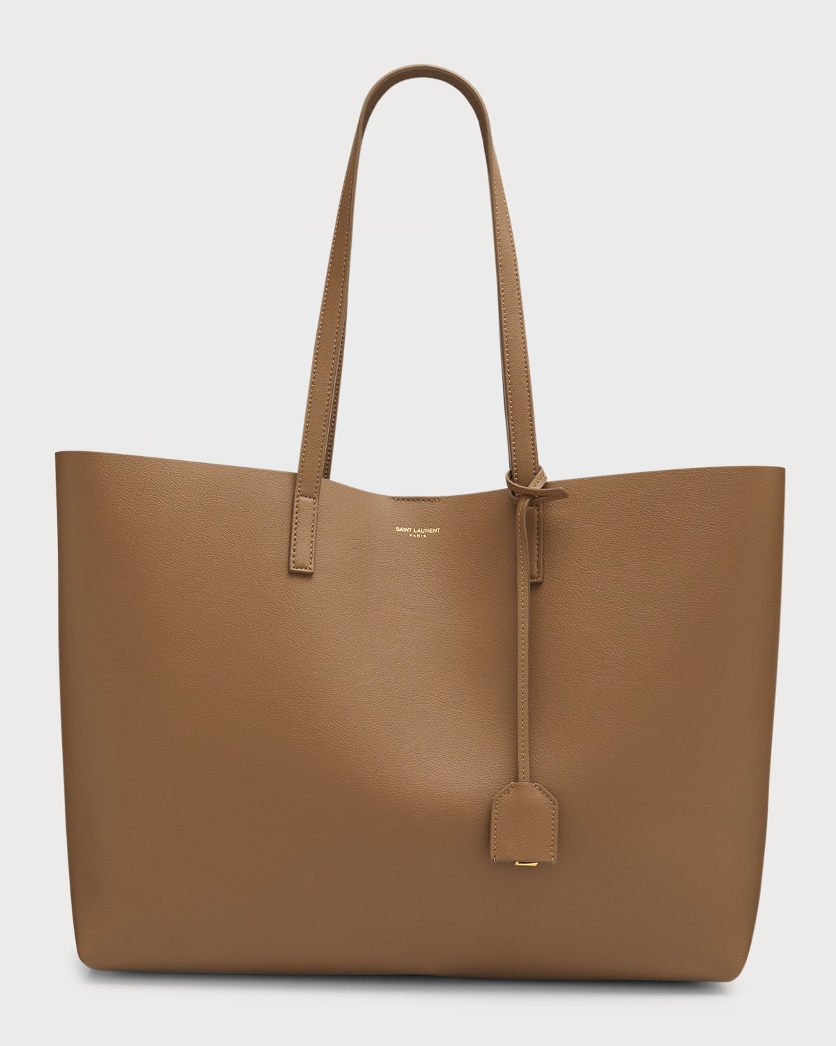 Saint Laurent East West Calfskin Shopping Tote Bag In 2346 Taupe