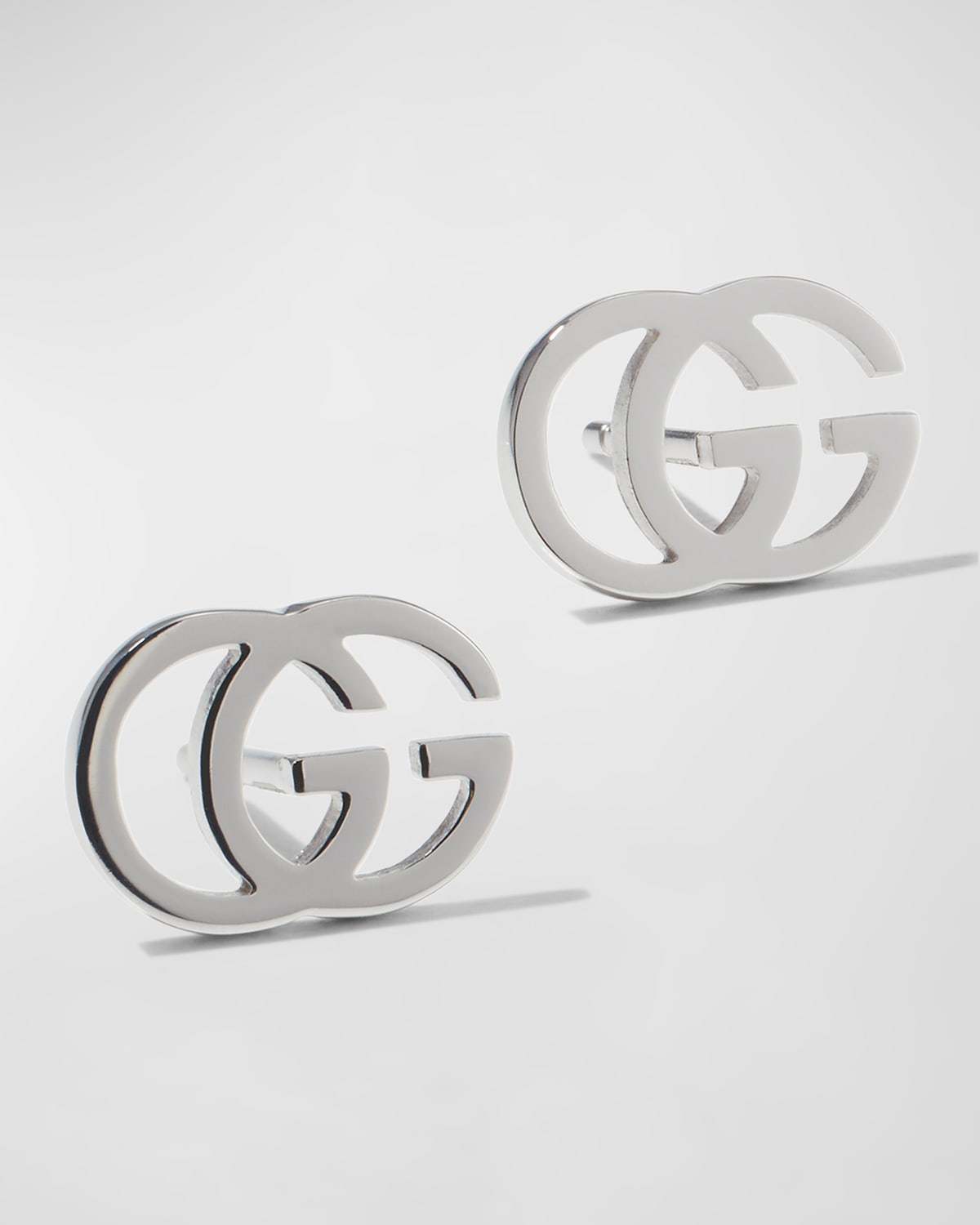 Shop Gucci 18k Gold Running G Stud Earrings In White/gold