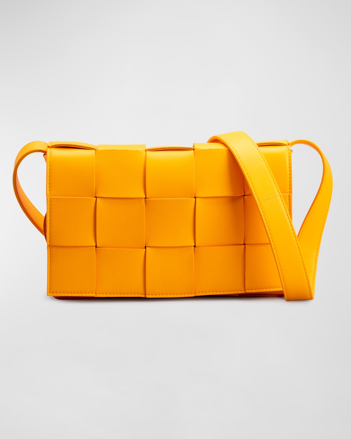 Bottega Veneta The Cassette Intrecciato Crossbody Bag In Tangerine-gold