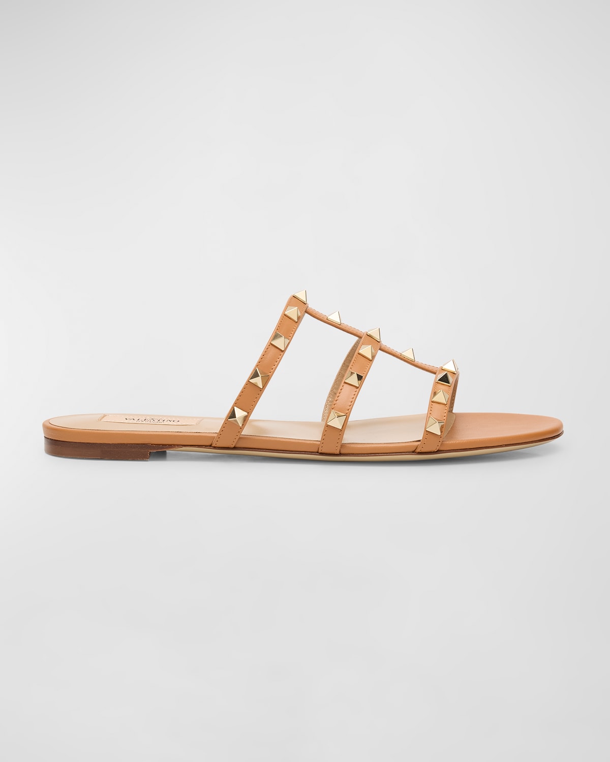 Shop Valentino Rockstud Caged Flat Slide Sandals In Kel Almond Beige
