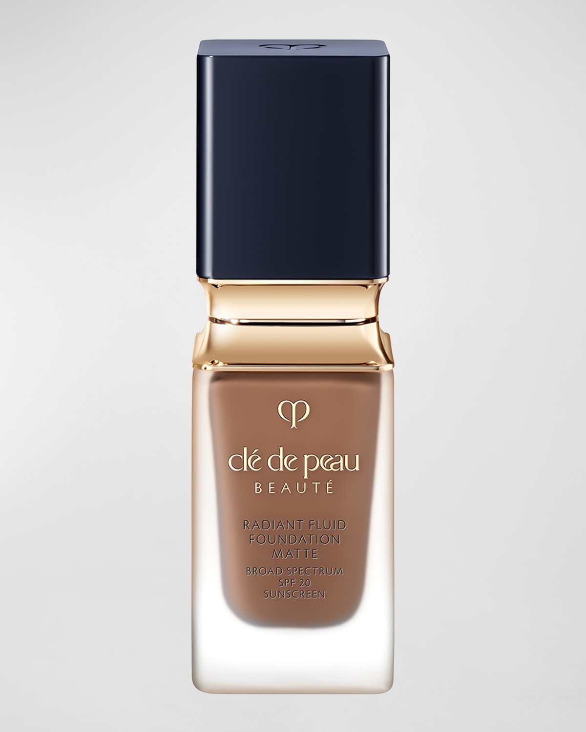 Clé De Peau Beauté Cle De Peau Beaute Radiant Fluid Foundation Matte Broad Spectrum Spf 20 Sunscreen 1.1 Oz. In O100 Rich Deep Oc