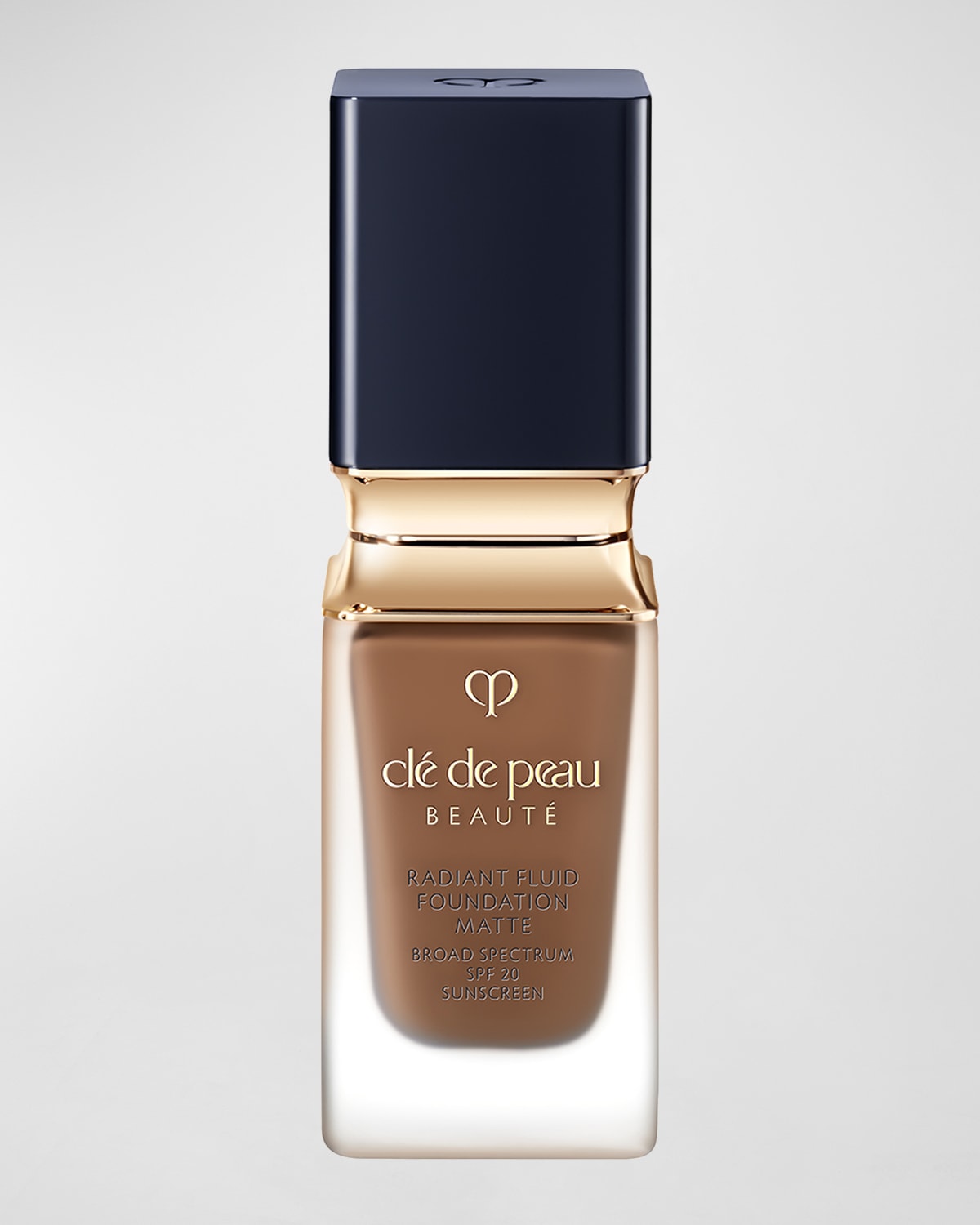 Clé De Peau Beauté Cle De Peau Beaute Radiant Fluid Foundation Matte Broad Spectrum Spf 20 Sunscreen 1.1 Oz. In B100 Rich Deep Be