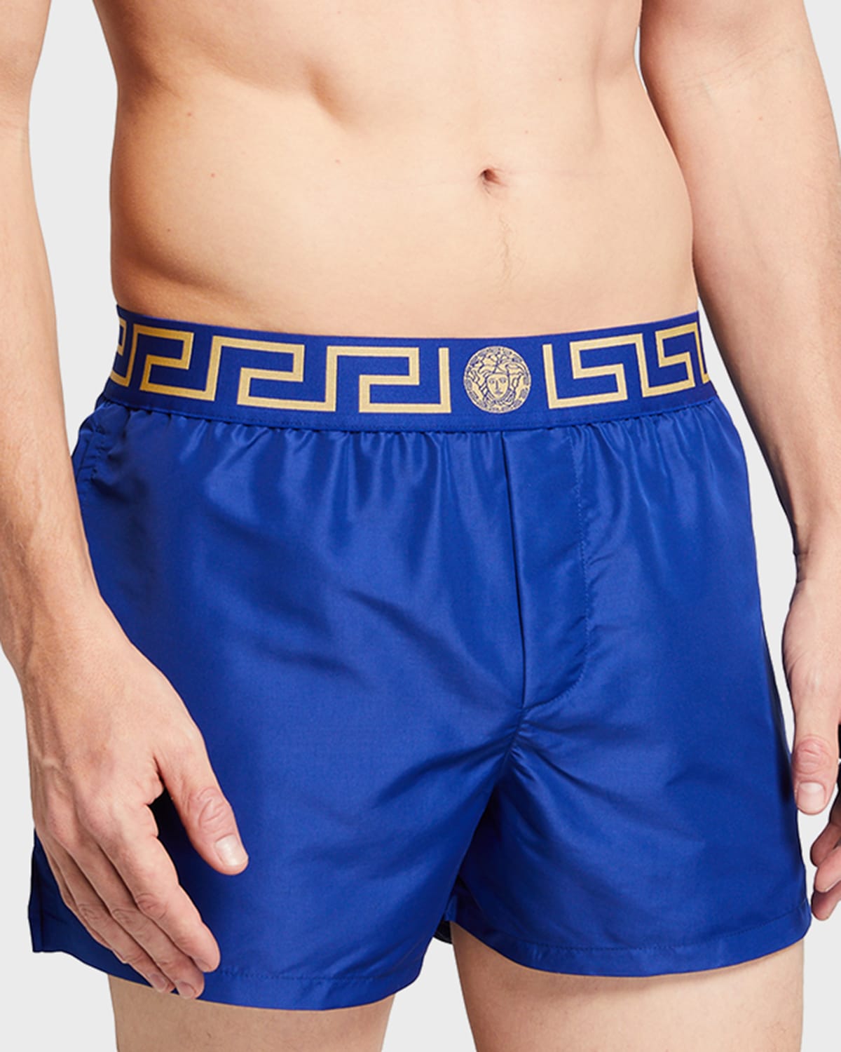Versace Logo Embroidered Swim Shorts In Blue/gold