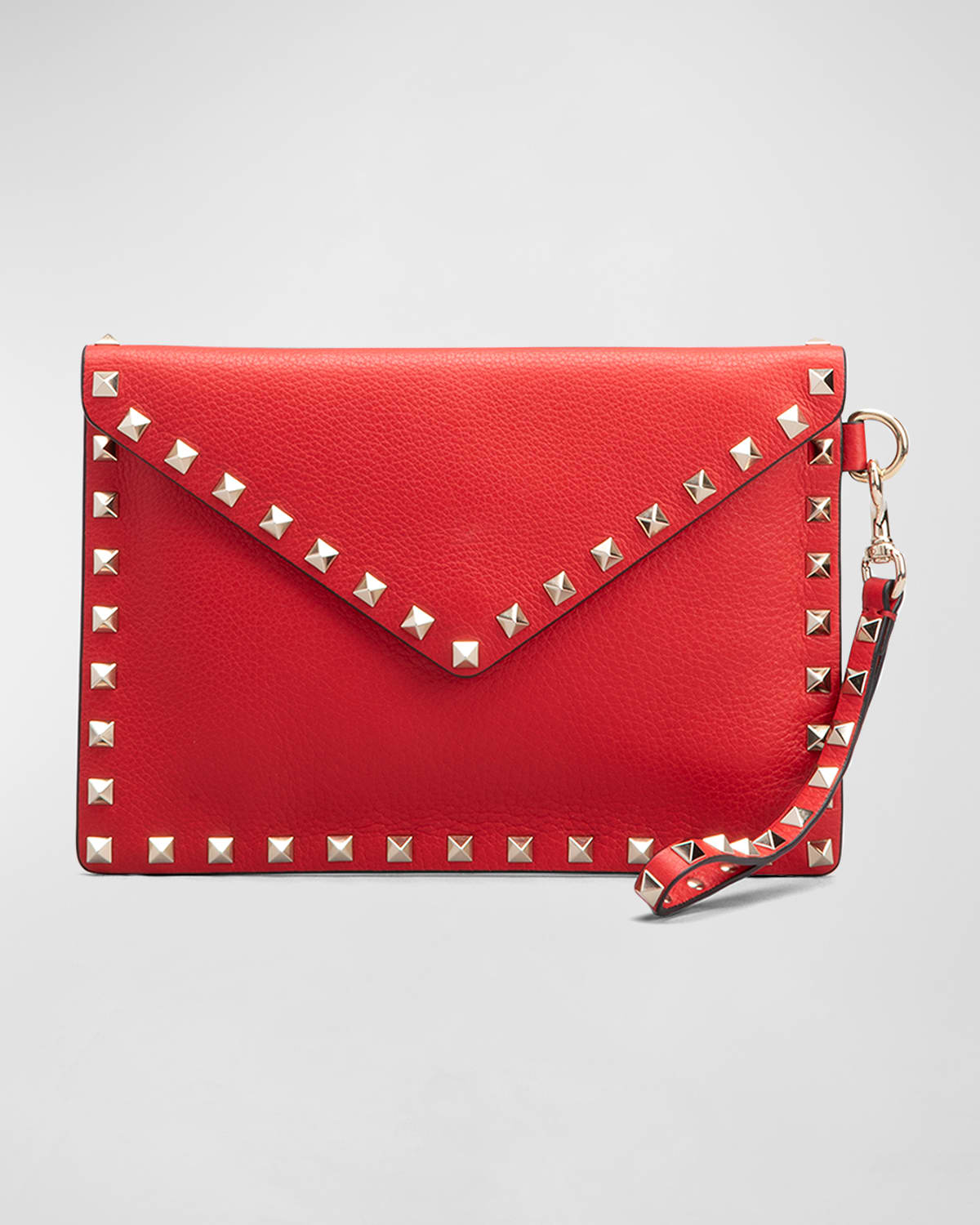 Valentino Garavani Rockstud Leather Clutch Bag In Red