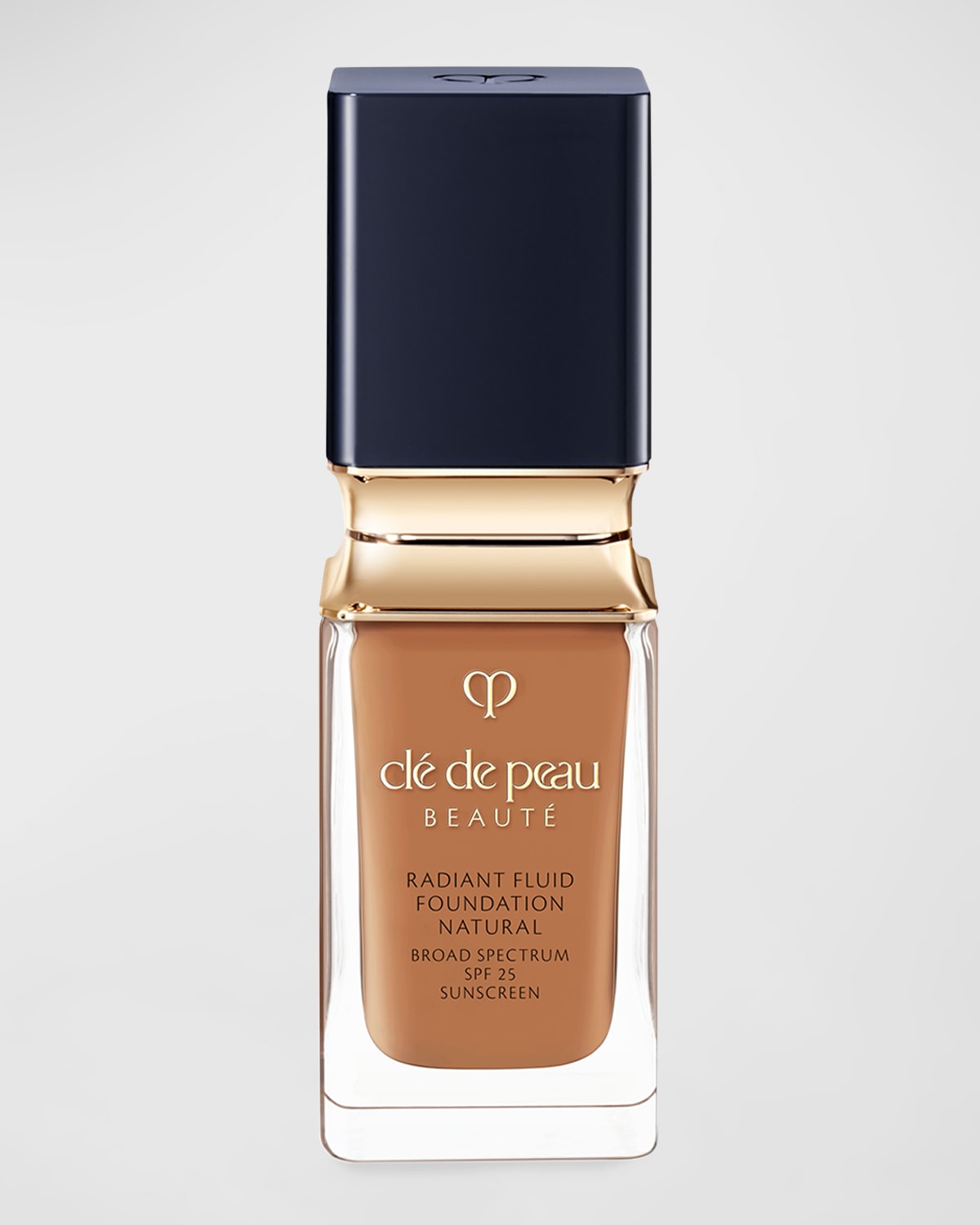 Clé De Peau Beauté Cle De Peau Beaute Radiant Fluid Foundation Natural Broad Spectrum Spf 25 In O70 Medium Deep Ocher