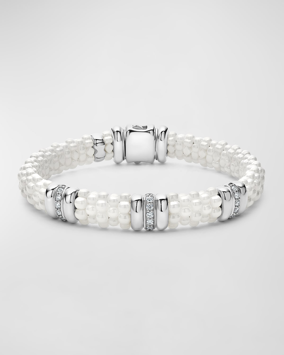 LAGOS STERLING SILVER AND GOLD WHITE CAVIAR WHITE CERAMIC 3-STATION DIAMOND 1-ROW BRACELET