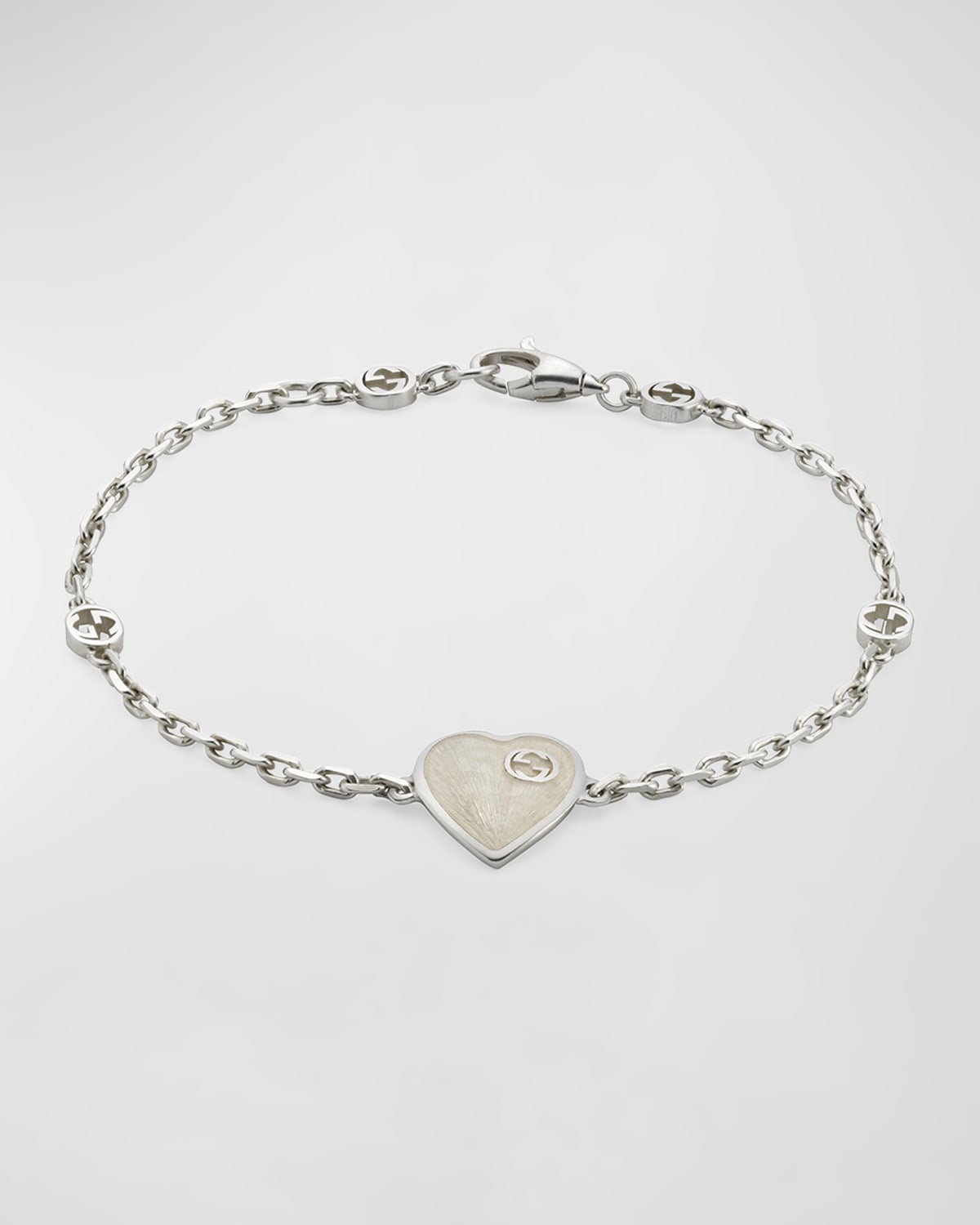 GUCCI STERLING SILVER HEART BRACELET WITH INTERLOCKING G