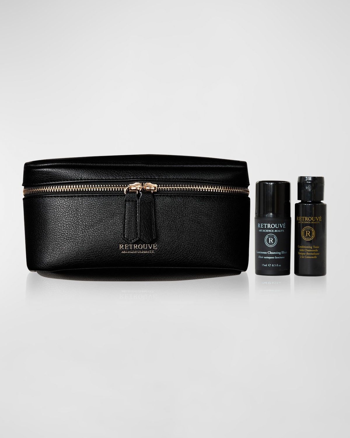 Vegan Pebbled Leather Cosmetic Bag, Luminous Cleansing Elixir 15mL and Conditioning Tonic with Chamomile 1 oz., Yours when you spend $250