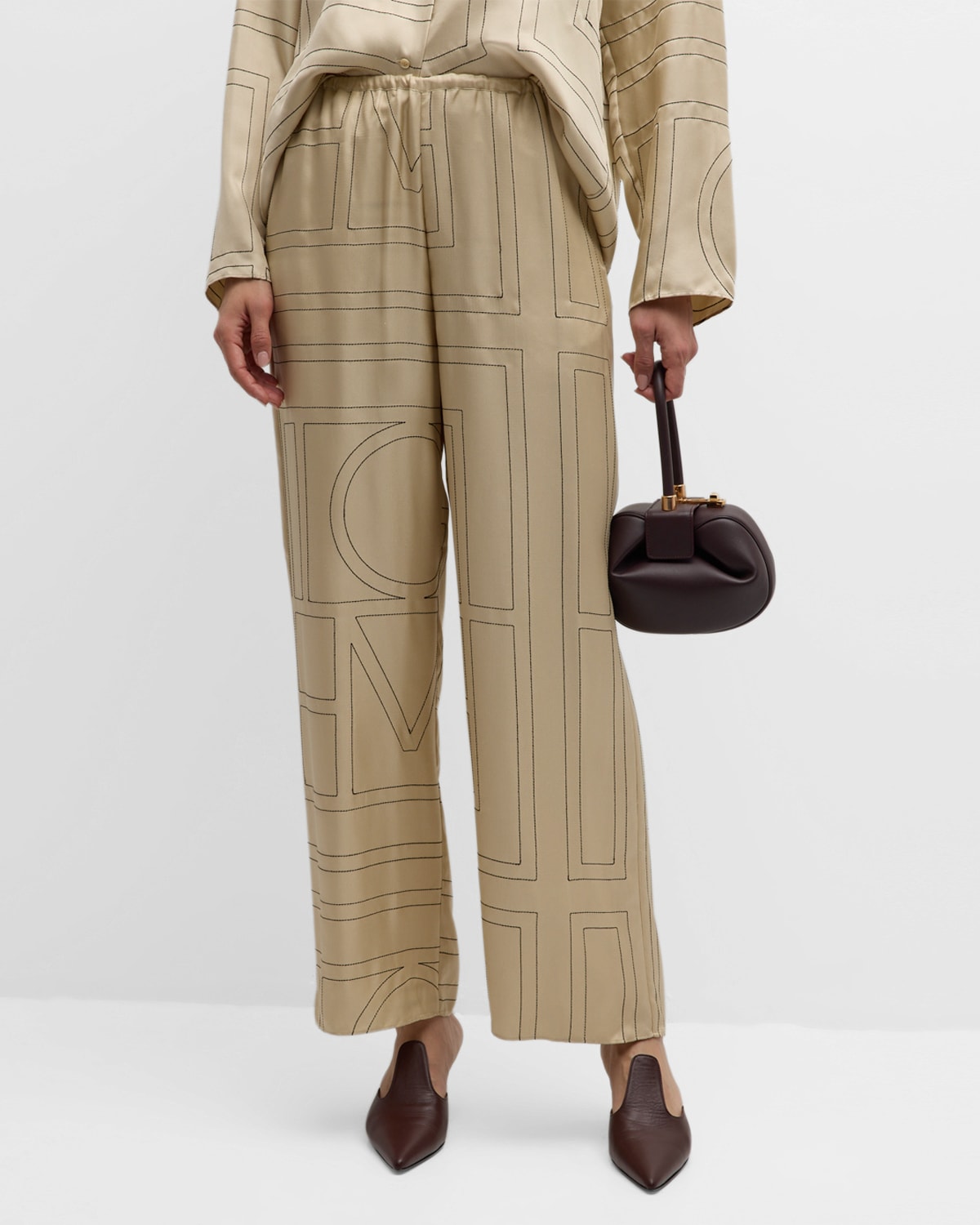 Shop Totême Monogram-embroidered Silk Pajama Pants In Natural