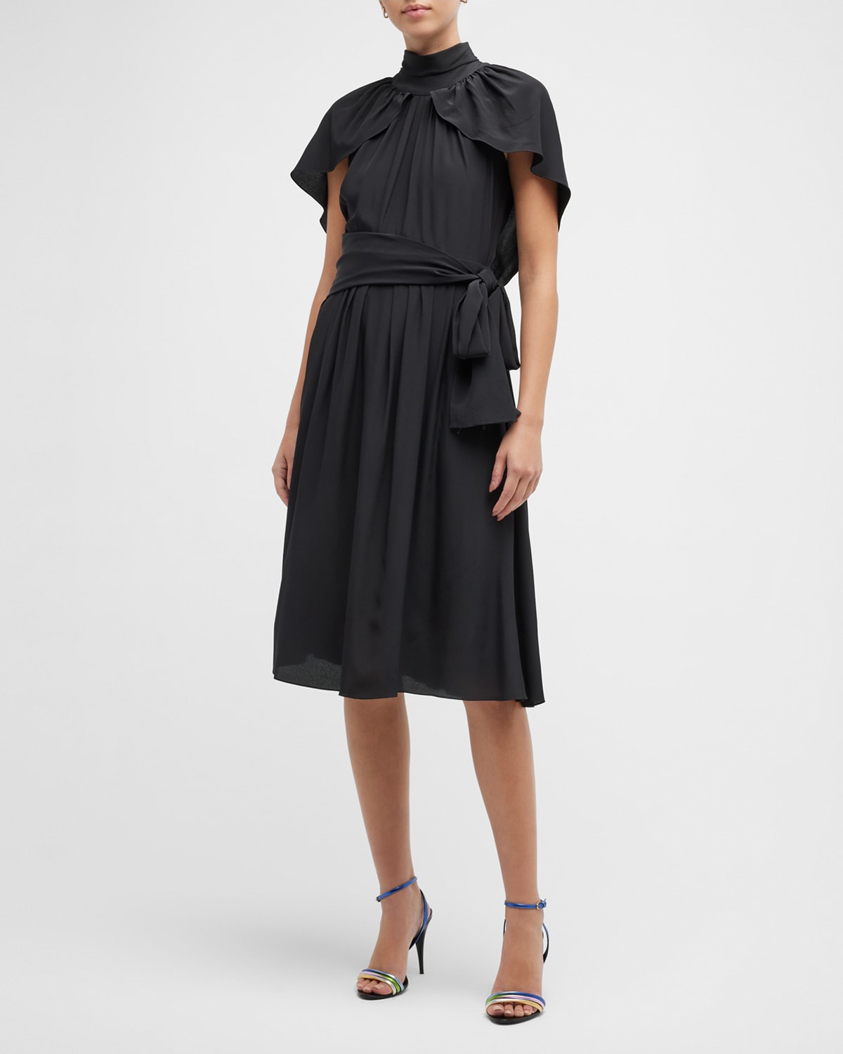 ARIAS New York Belted Sleeveless Cape Dress