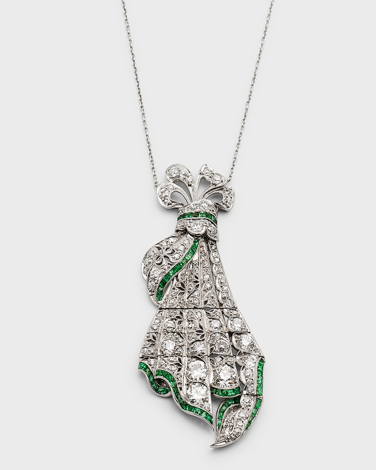 Estate Platinum Diamond and Calibre Emerald Flexible Bow Pendant Necklace