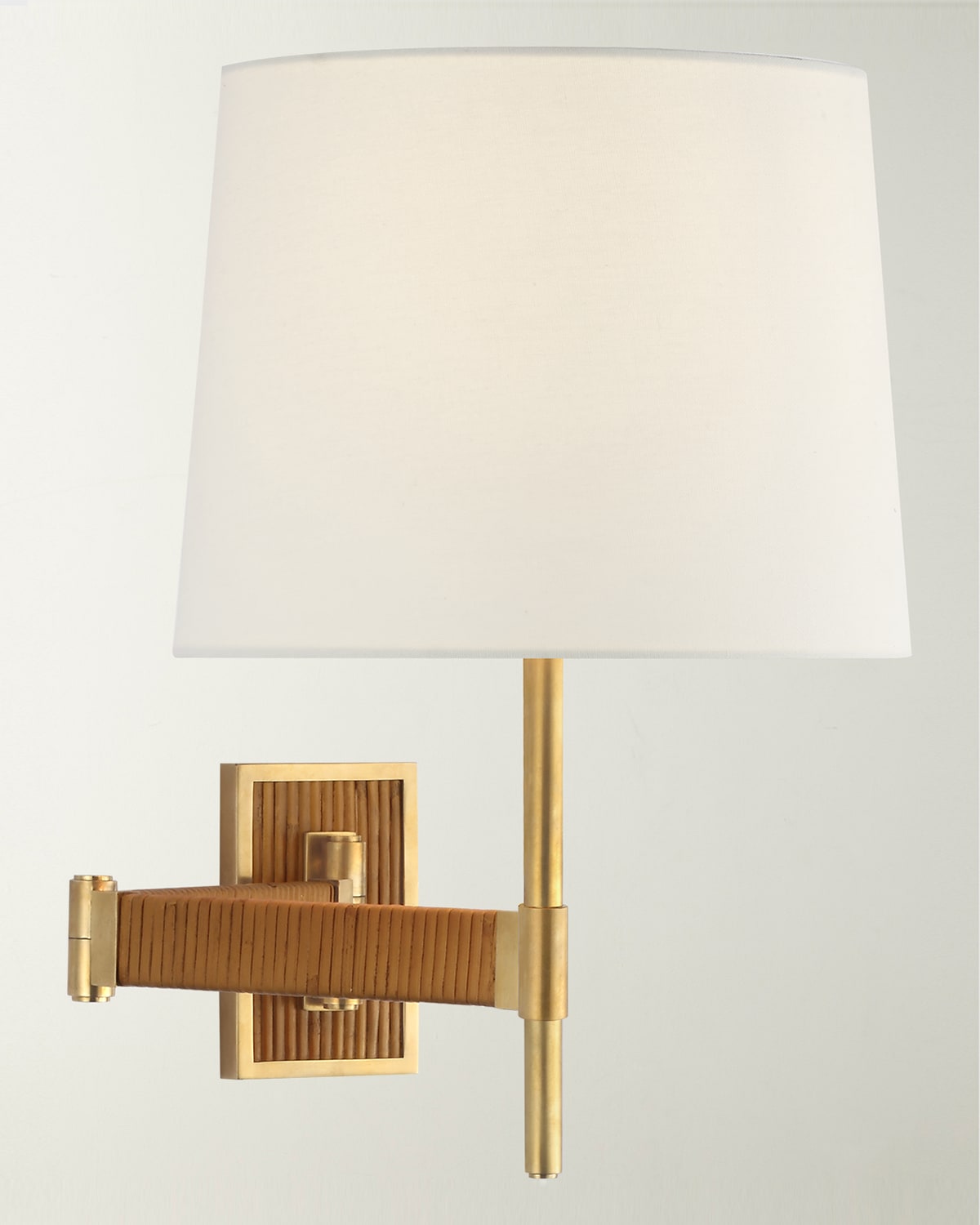 Shop Visual Comfort Signature Elle Swing Arm Sconce In Hand-rubbed Antique Brass And Dark Rattan With Linen Shade By Suzanne Kasle
