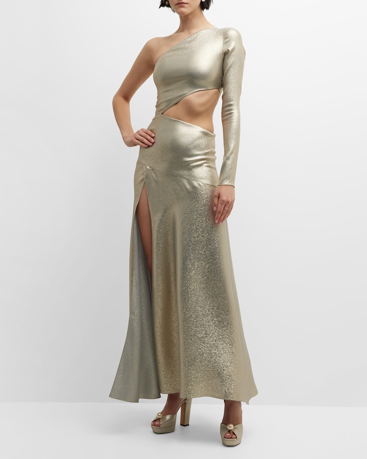 Adriana Iglesias Mirta Cutout Metallic One-shoulder Maxi Dress In Light Gold