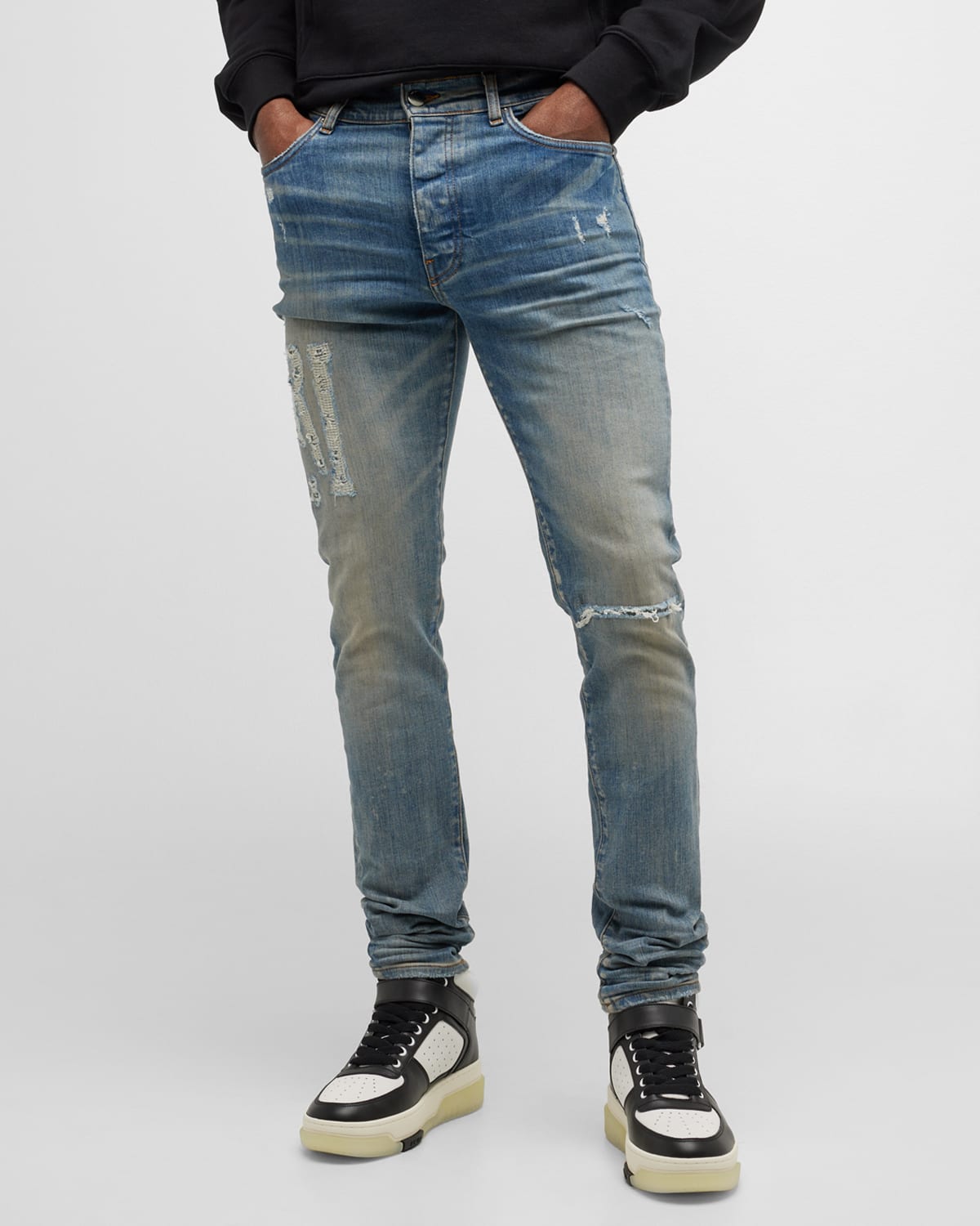 AMIRI MEN'S DISTRESSED LOGO TAPERED JEANS