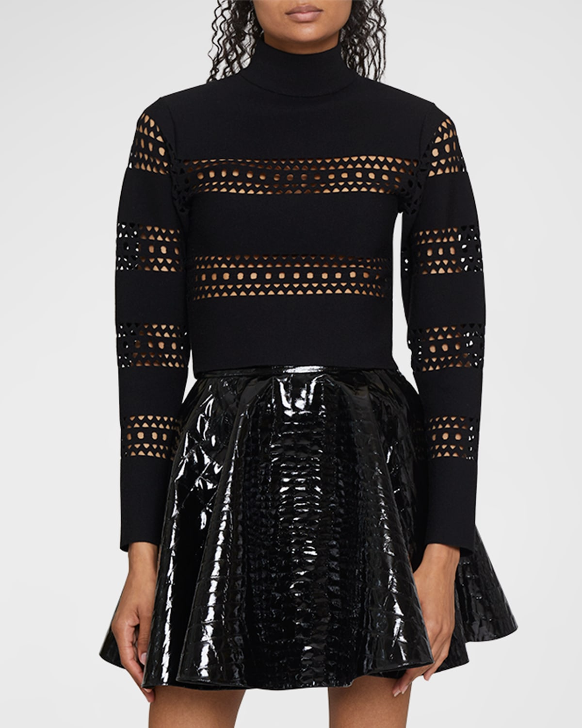 Alaïa Vienne Laser Cutout Mock-neck Top In Noir Alaia
