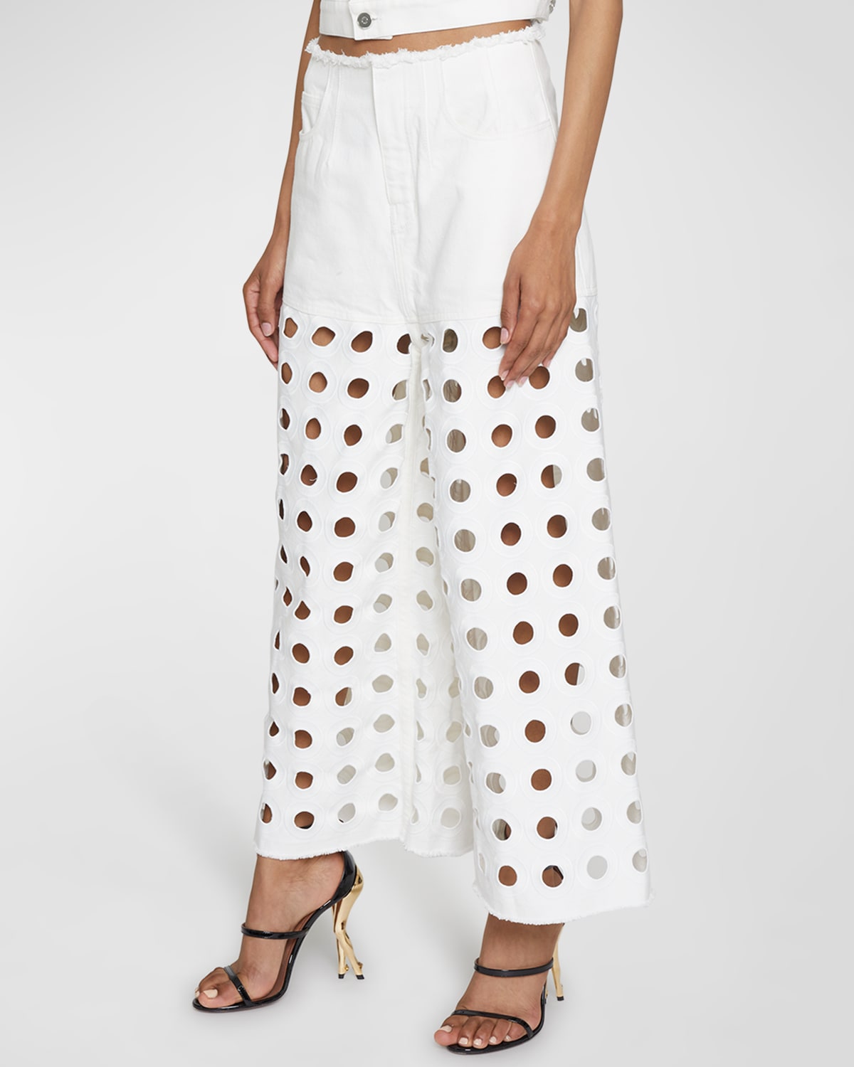 Alaïa Low-rise Circle Eyelet Wide-leg Ankle Denim Pants In Blanc