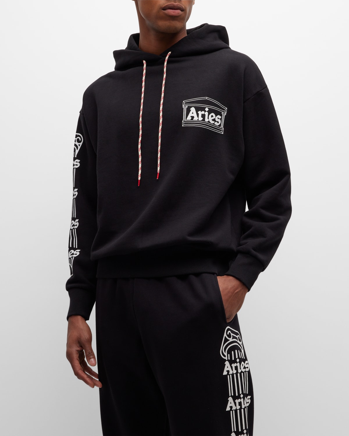 Aries Logo Printed Drawstring Hoodie In Black