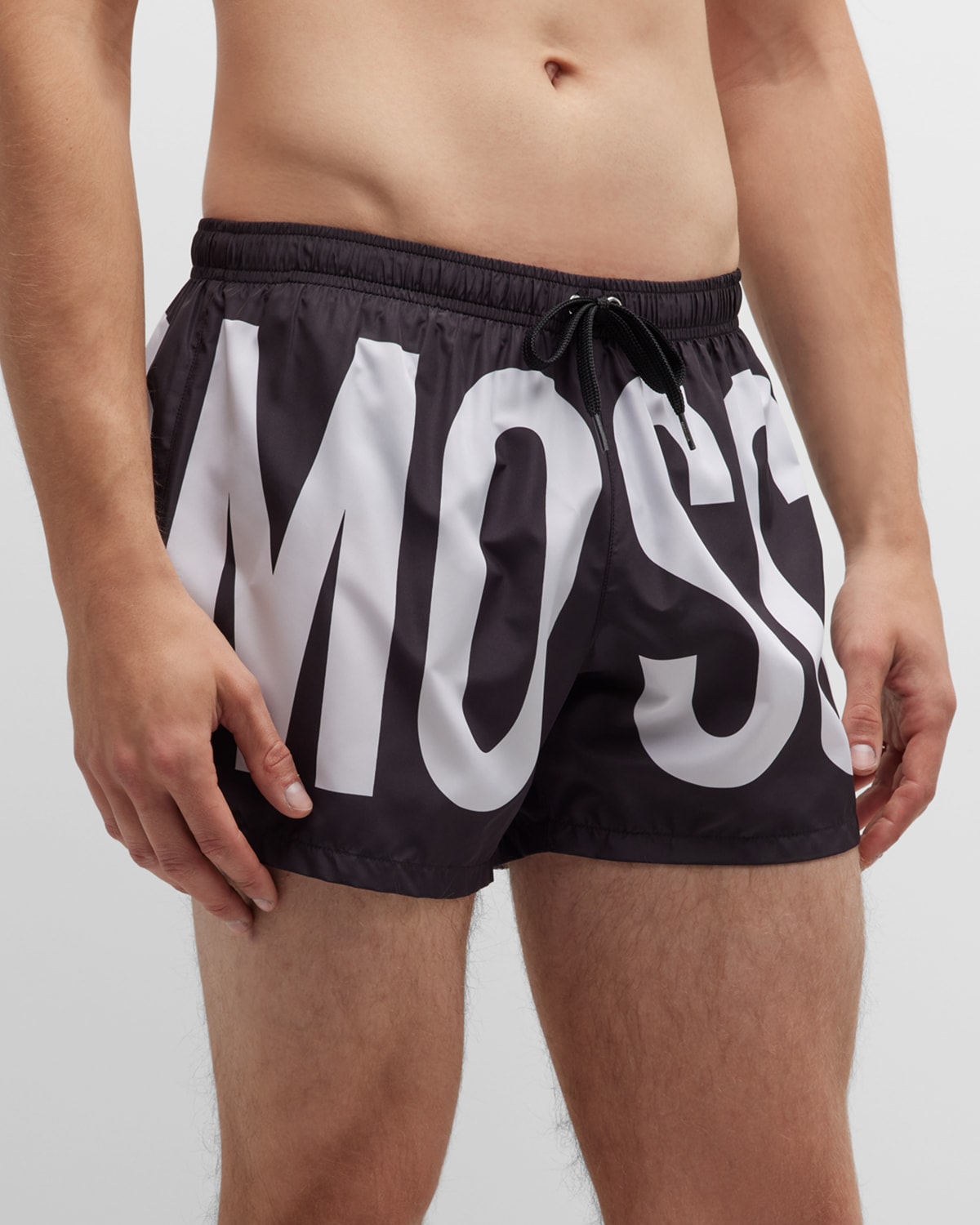 Shop Moschino Men's Full Logo Swim Shorts In Black