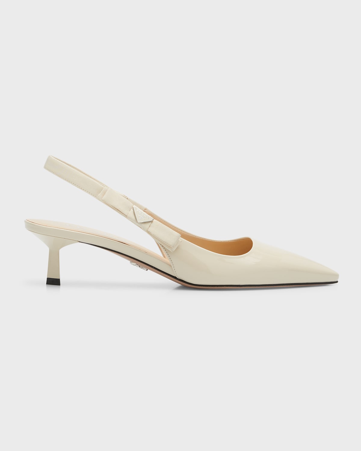 Shop Prada Patent Bow Slingback Pumps In Avorio