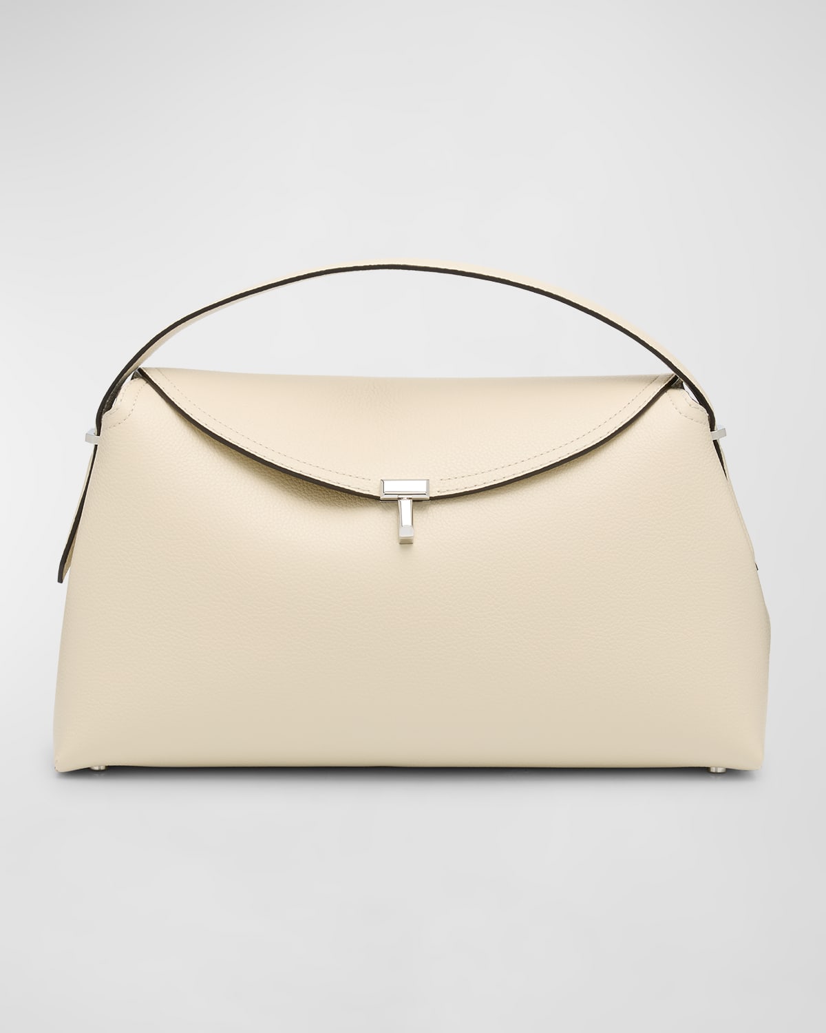 Totême T-lock Top Handle Bag In Pebble Grain Leather In Milk