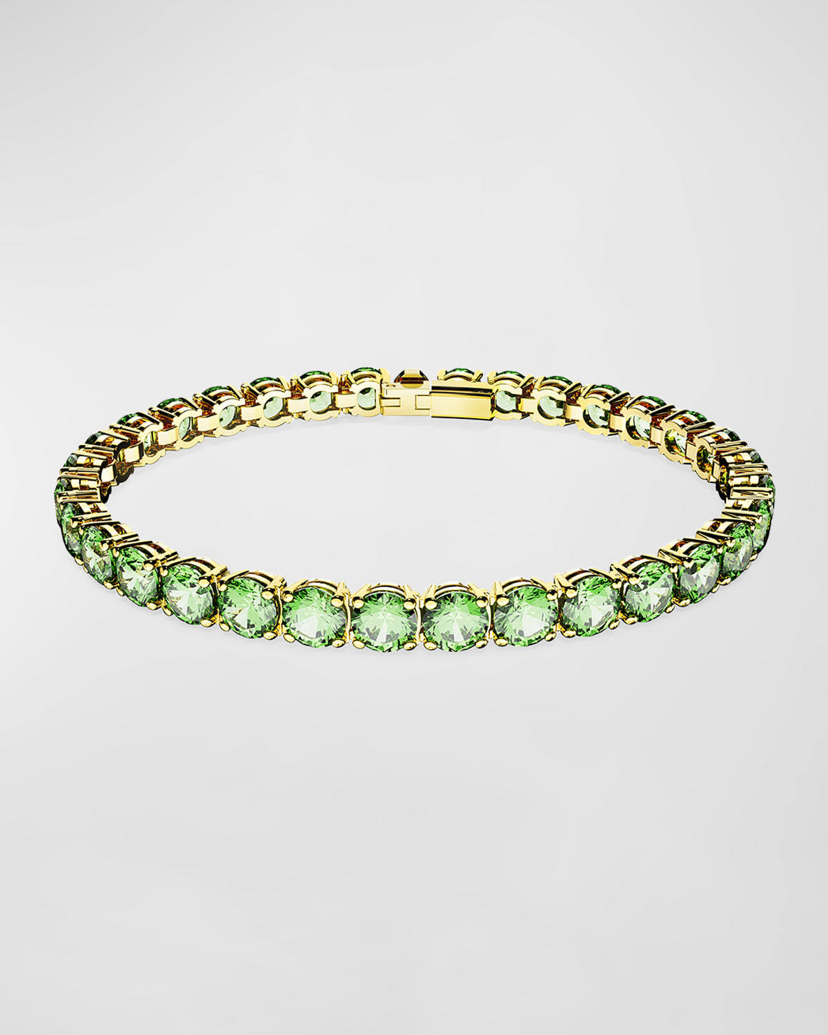 Shop Swarovski Matrix Gold-tone Round-cut Green Crystal Tennis Bracelet