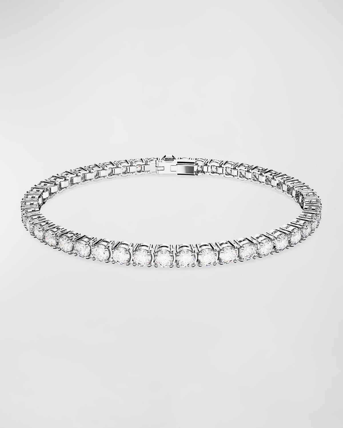 Shop Swarovski Matrix Rhodium-plated Round-cut Crystal Tennis Bracelet In Clear