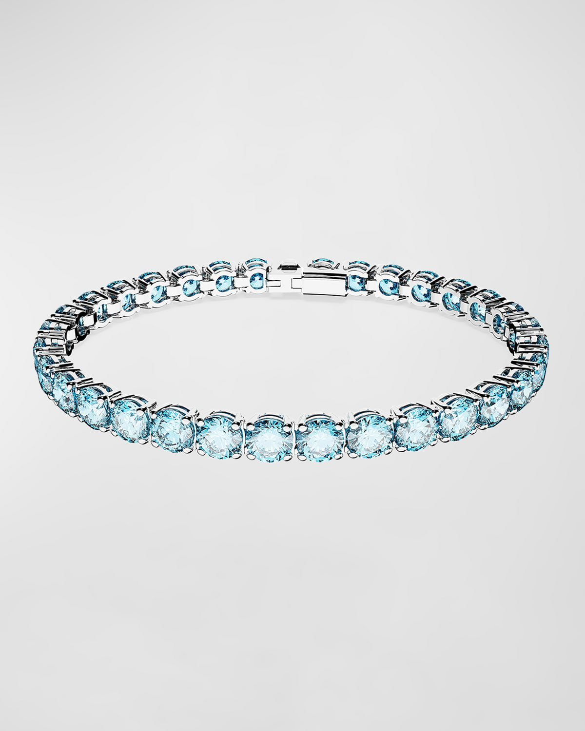 Shop Swarovski Matrix Rhodium-plated Round-cut Blue Crystal Tennis Bracelet